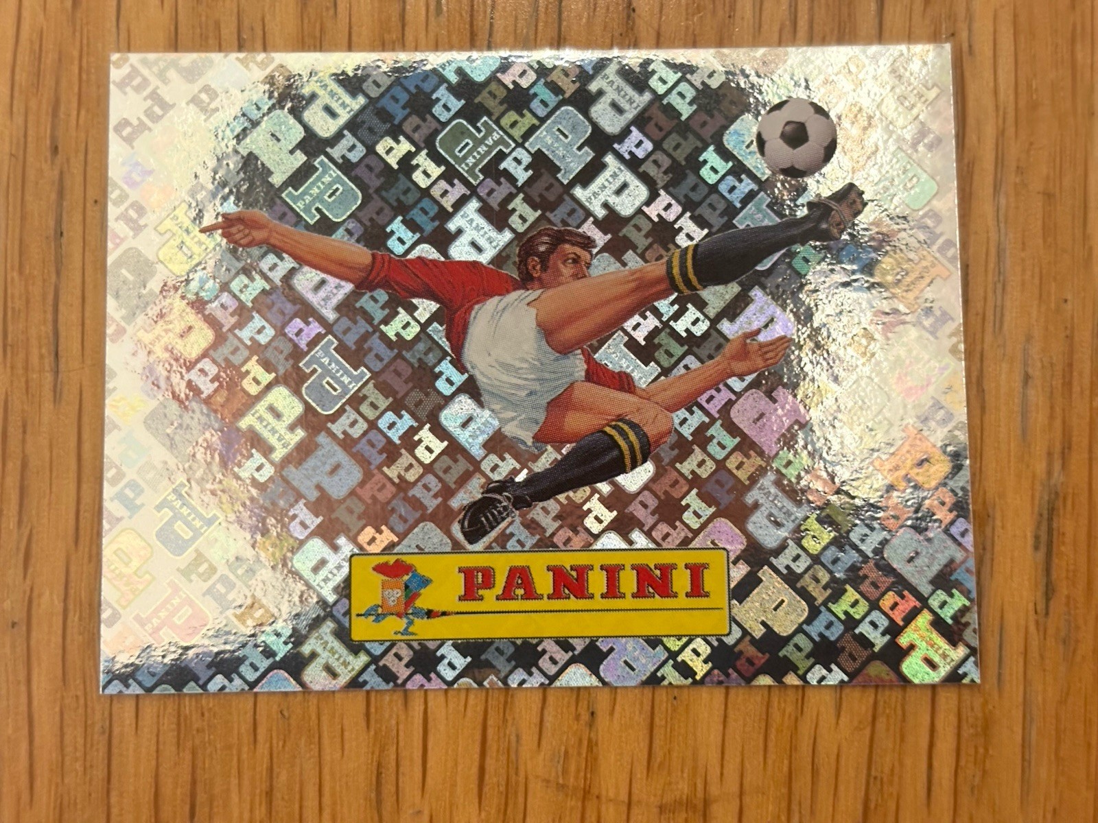 2026 Panini World Cup Sticker #00 Bicycle Kick Silver Logo Foil Silver SSP
