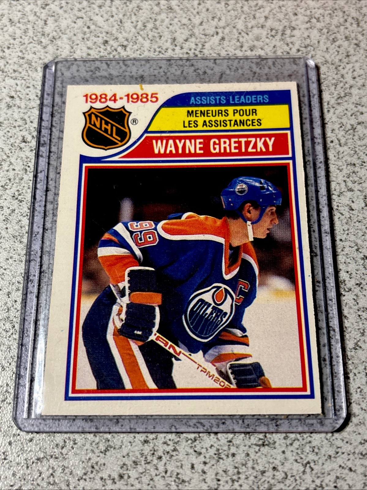 1985-86 O-Pee-Chee WAYNE GRETZKY #258 “Assists Leader” Edmonton Oilers GOAT HOF