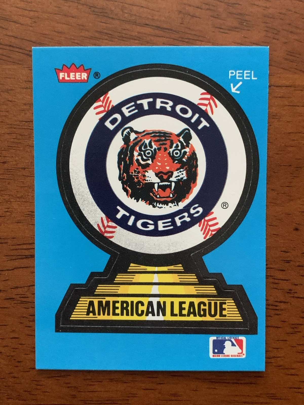 1987 Fleer Team Stickers #18 – Tigers Team Logo w/ Mariners on card back – NMMT