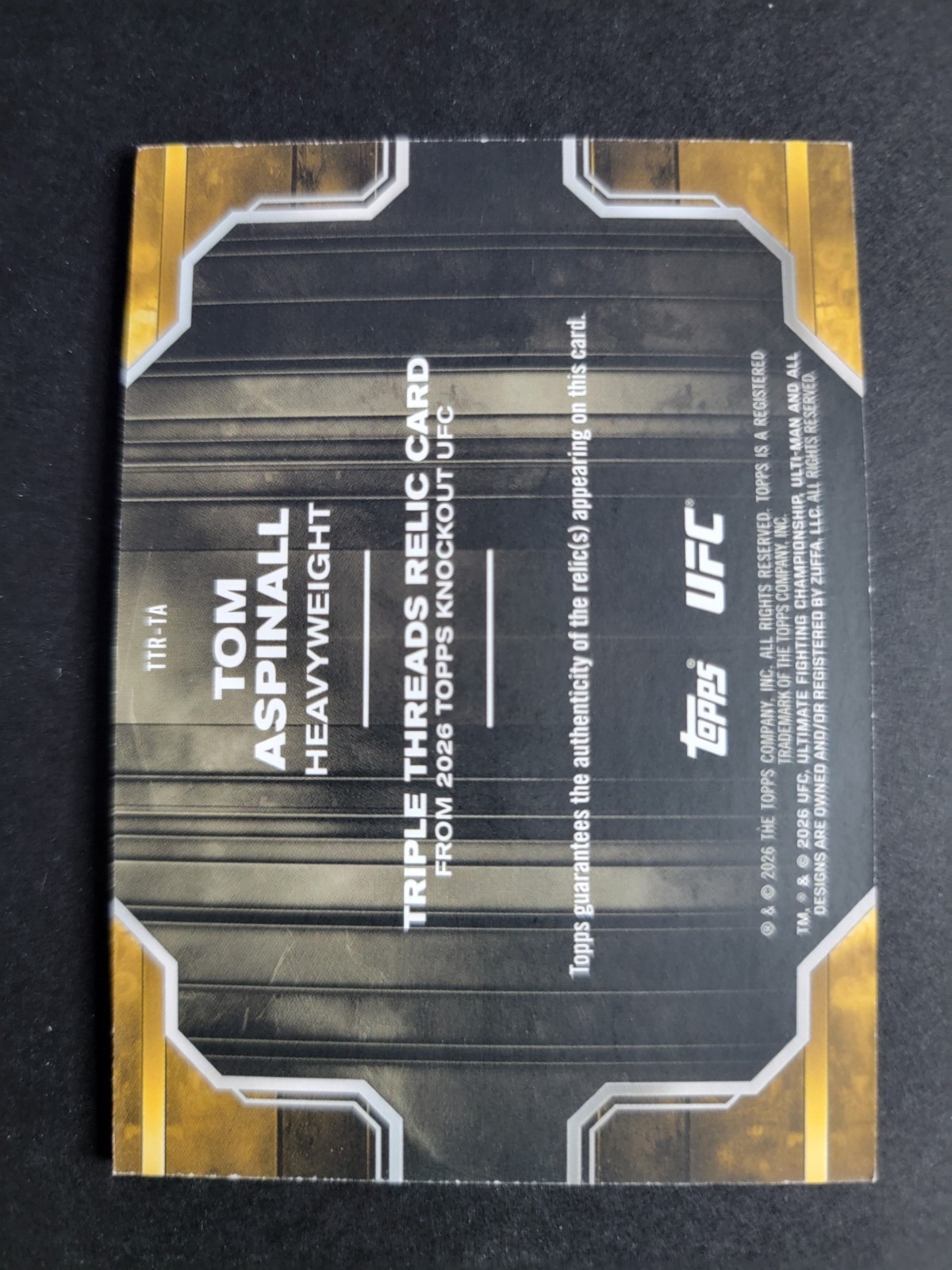 Tom Aspinall 2026 Topps Knockout UFC Triple Threads Relic Blue /50
