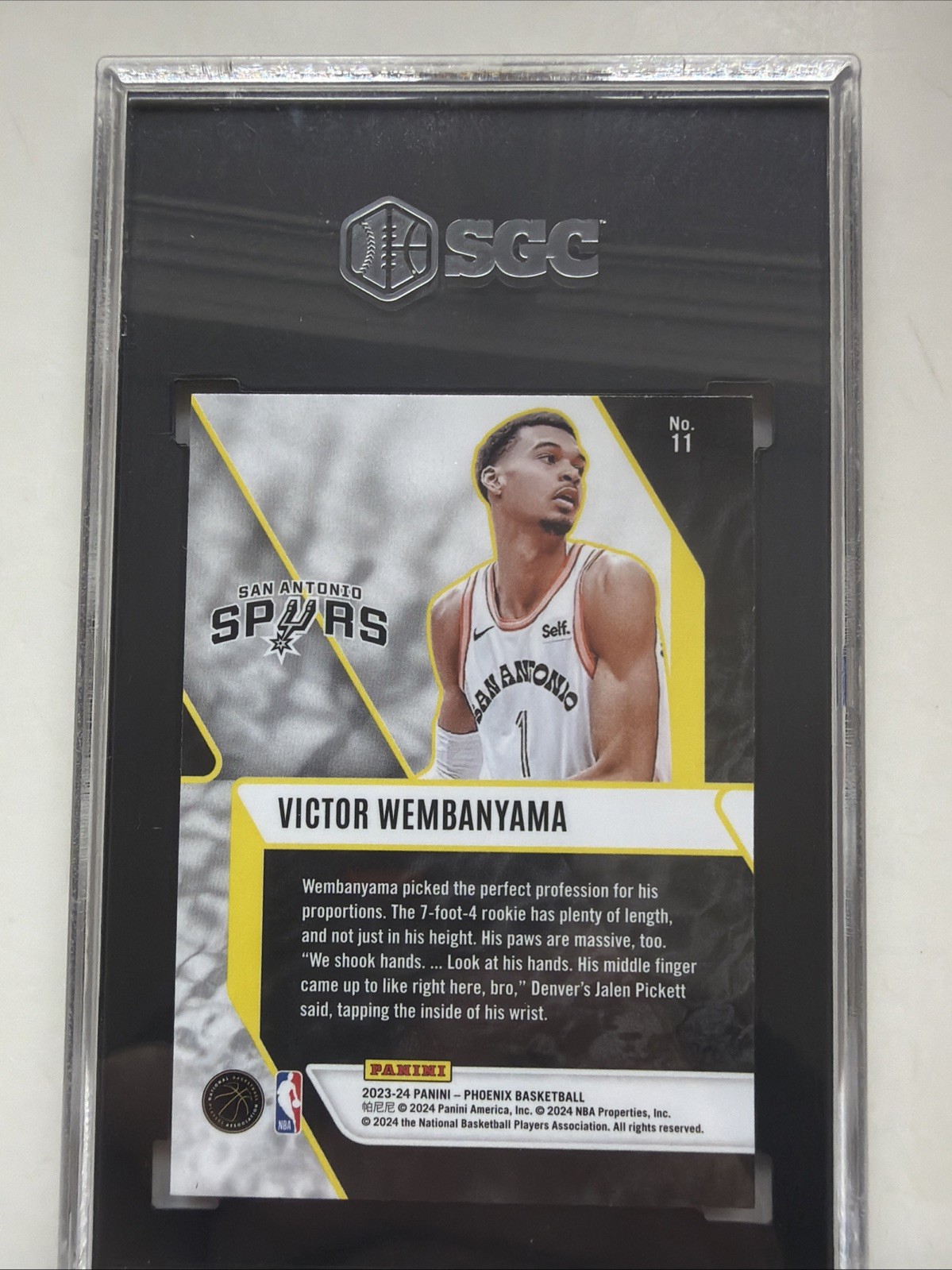 2023-24 Panini Phoenix – Fade to Black Victor Wembanyama #11 Blue Ice (RC)