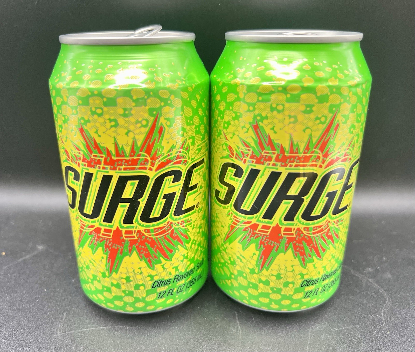 RARE Lot of 2 Empty Surge Cans WCW Wrestling Nitro Bill Goldberg & Kevin Nash