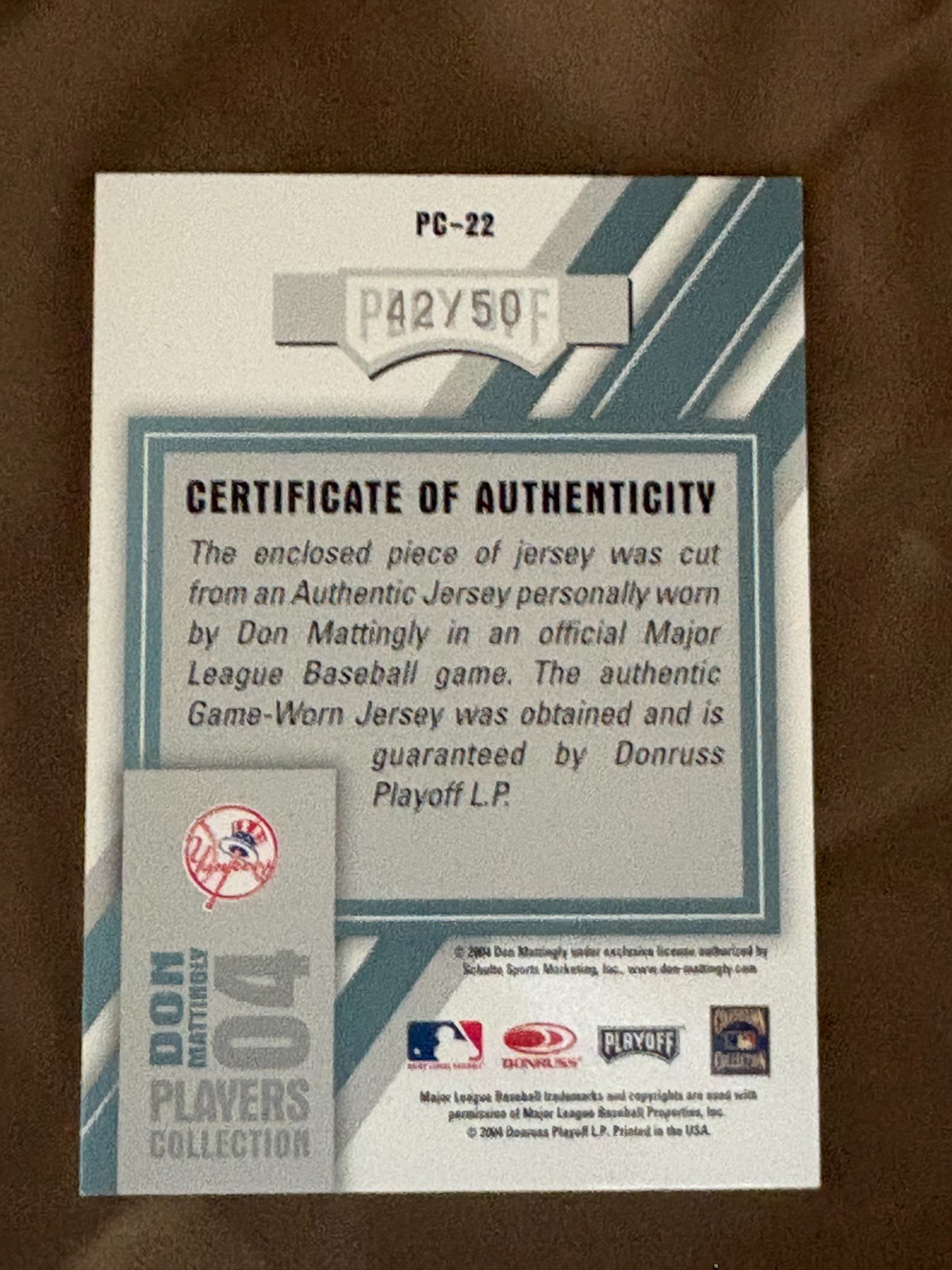 2004 Donruss Playoff Honors Don Mattingly Game Worn Jersey PC-22 42/50