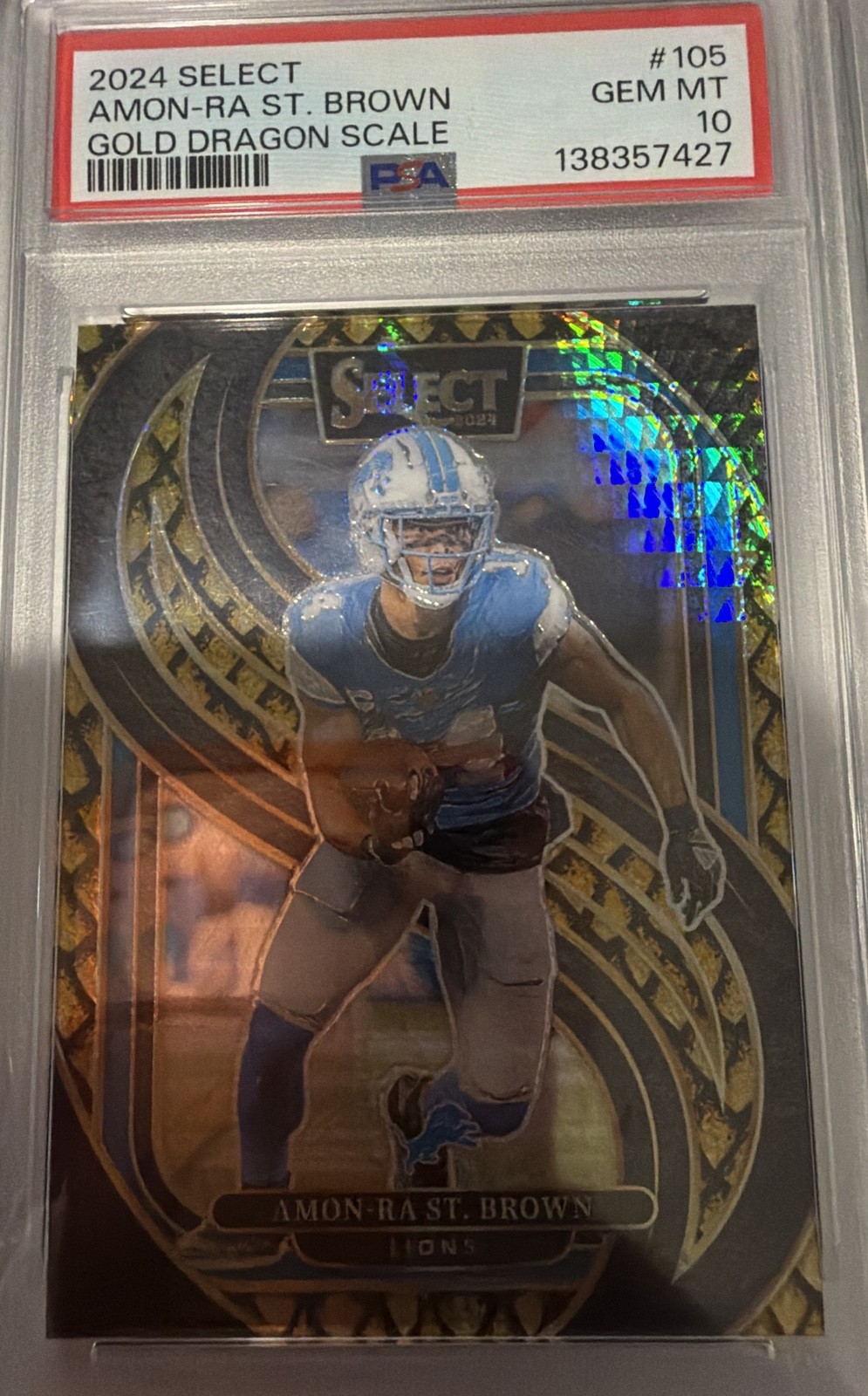2024 Panini Select – Premier Level Amon-Ra St. Brown #105 Gold Dragon Scale…