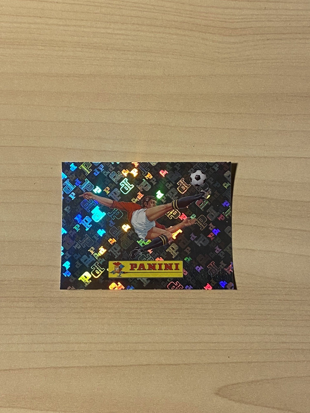 2026 Panini FIFA World Cup Sticker Foil #00 Kicking Soccer Ball