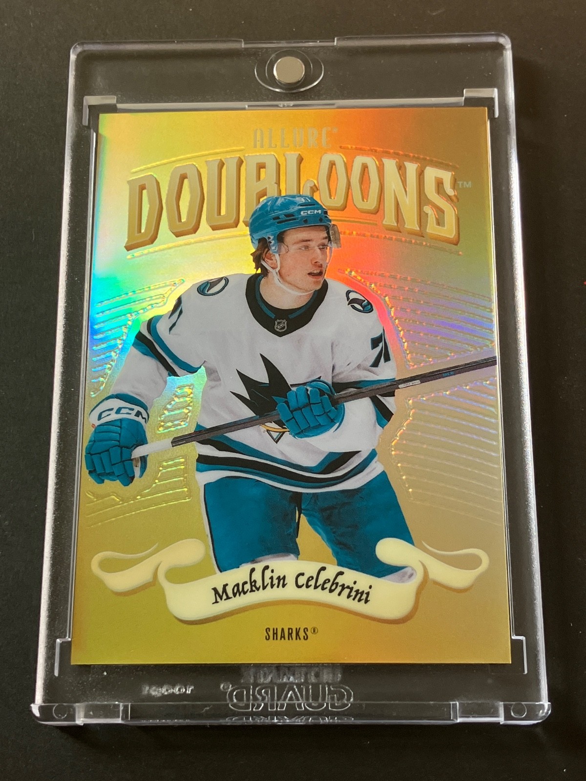 2025-26 Upper Deck Allure Doubloons Macklin Celebrini DB-25. Rare Case Hit