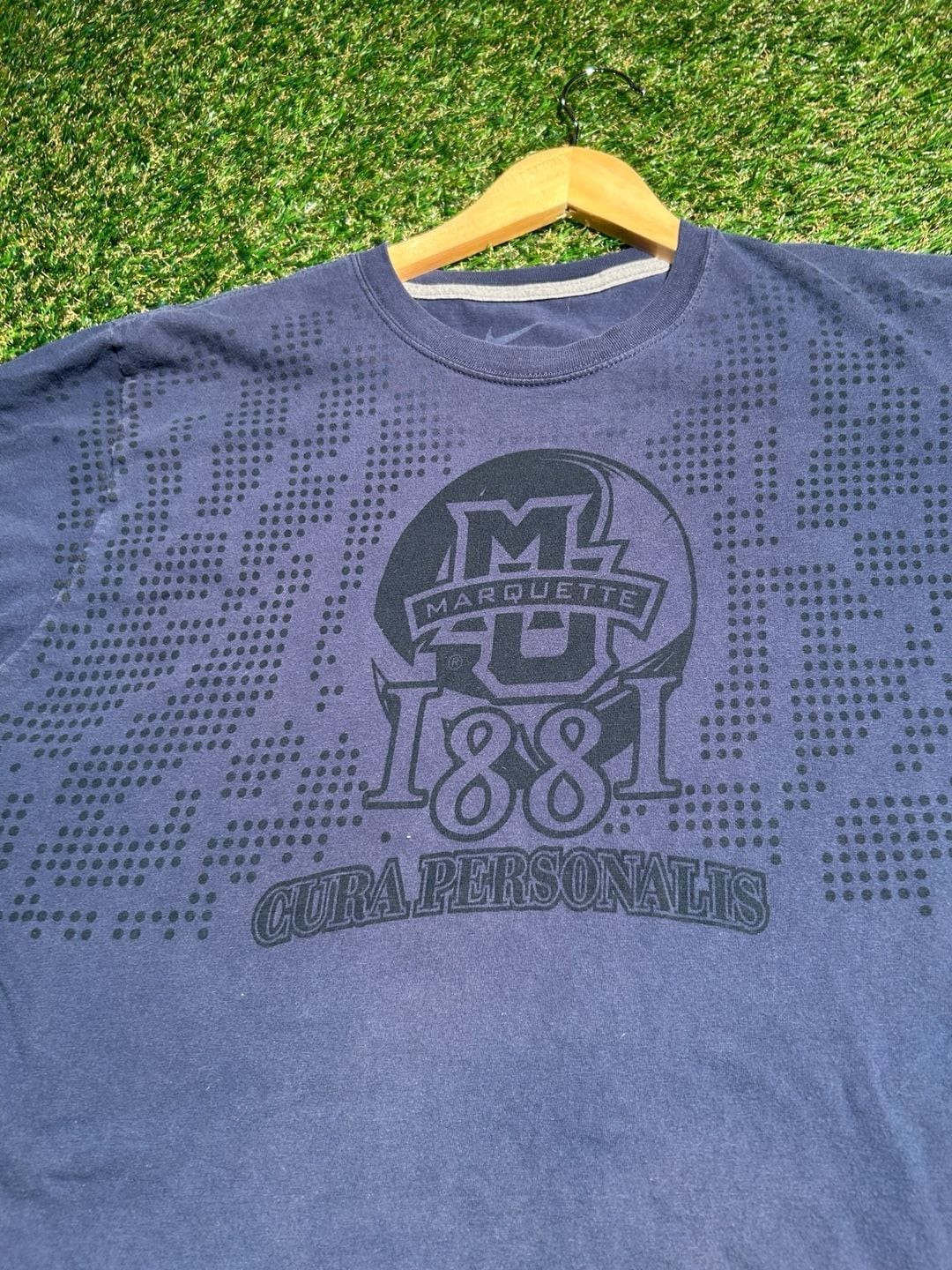 Nike Jordan Marquette Golden Eagles 1881 Cura Personalis Graphic T-Shirt