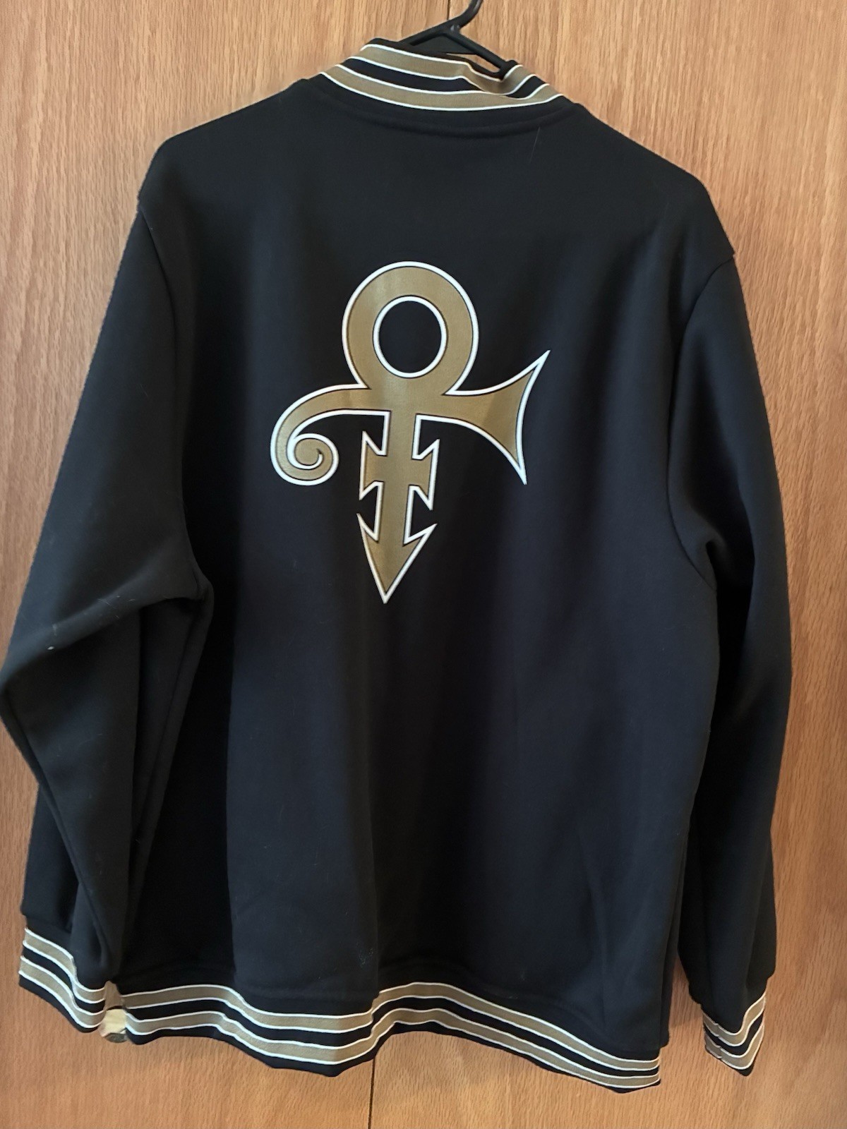 Minnesota Twins Prince Night 2021 fleece bomber jacket gold “Prince” embroidery.