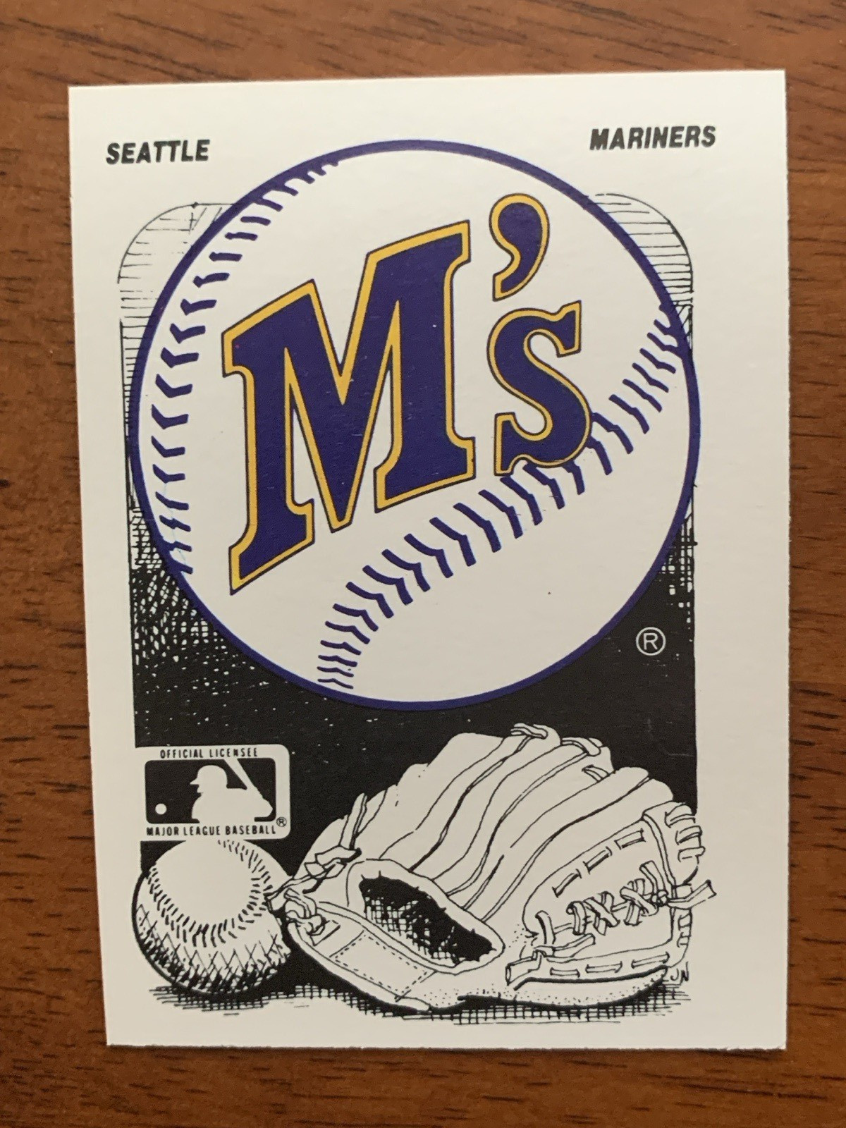 1987 Fleer Team Stickers #18 – Tigers Team Logo w/ Mariners on card back – NMMT