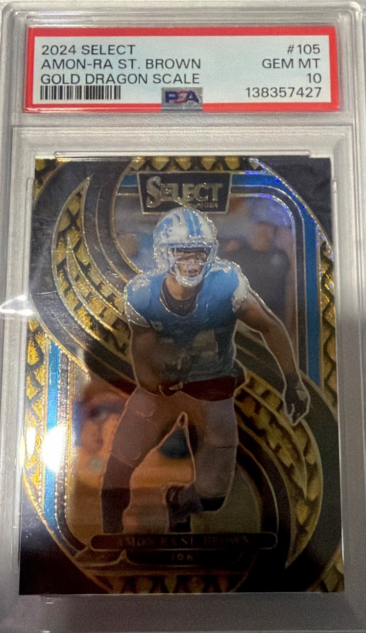 2024 Panini Select – Premier Level Amon-Ra St. Brown #105 Gold Dragon Scale…