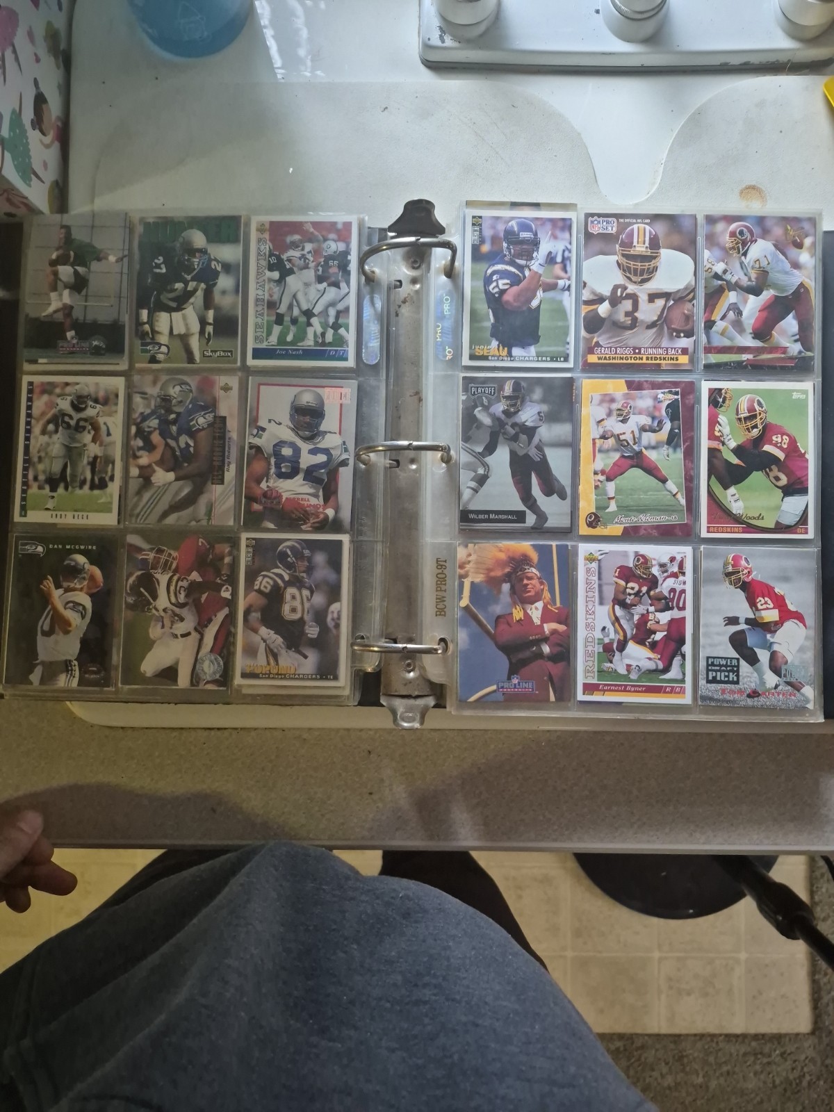 1991-95 football and basketball binder full of cards, front and back 500+ cards