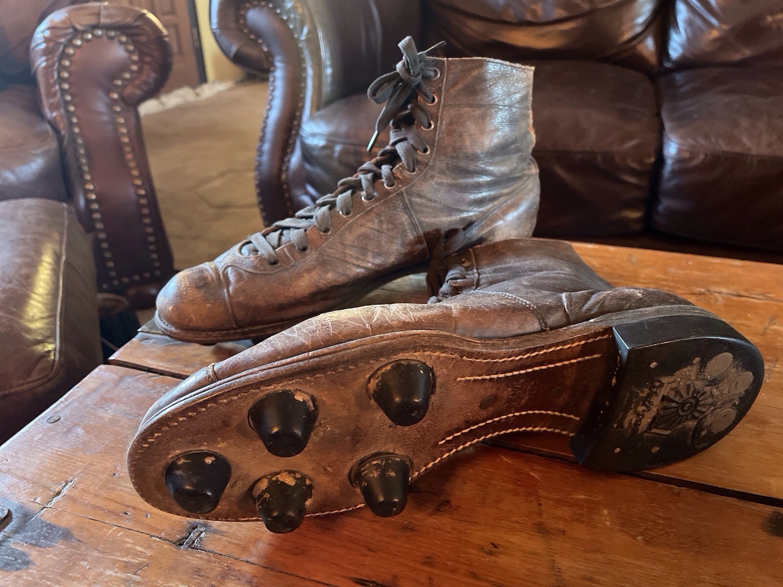 Football Rugby shoes antique leather with cleats vintage sports memorabilia