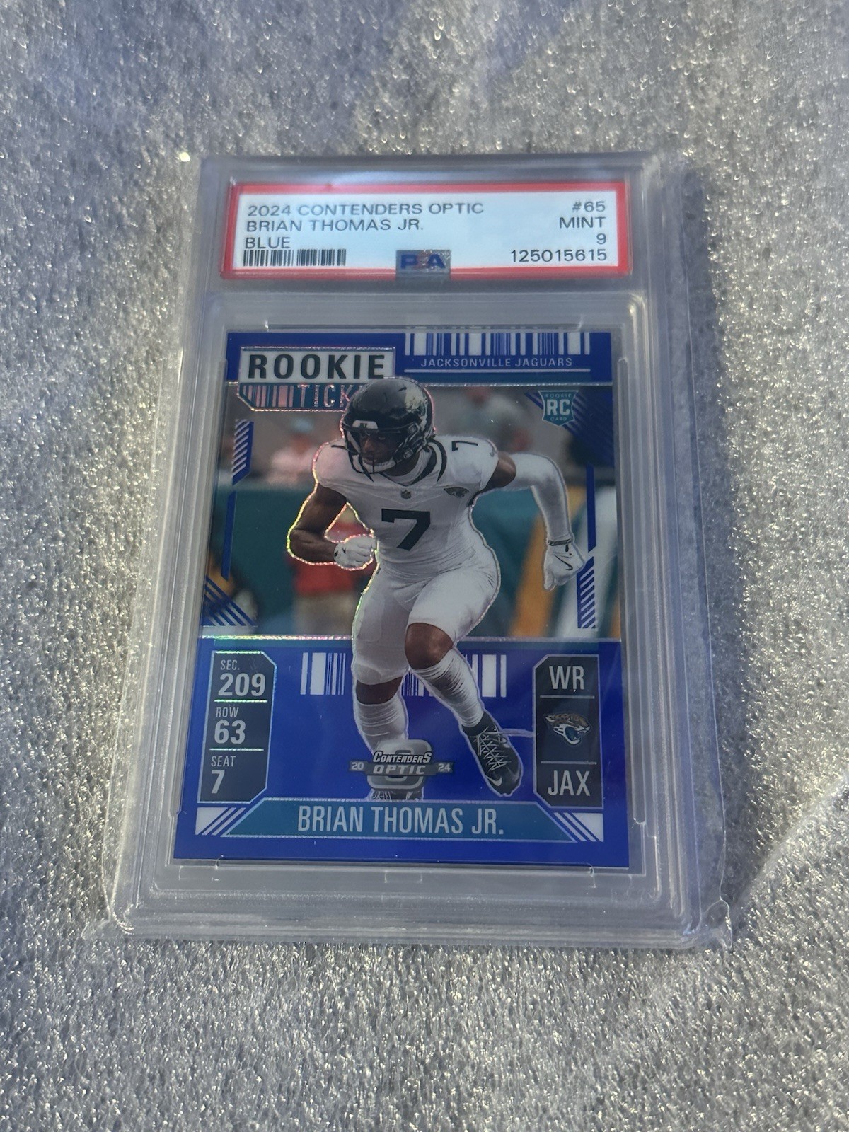 2024 Panini Contenders Optic Brian Thomas Jr. Blue Prizm Rookie #65 PSA 9