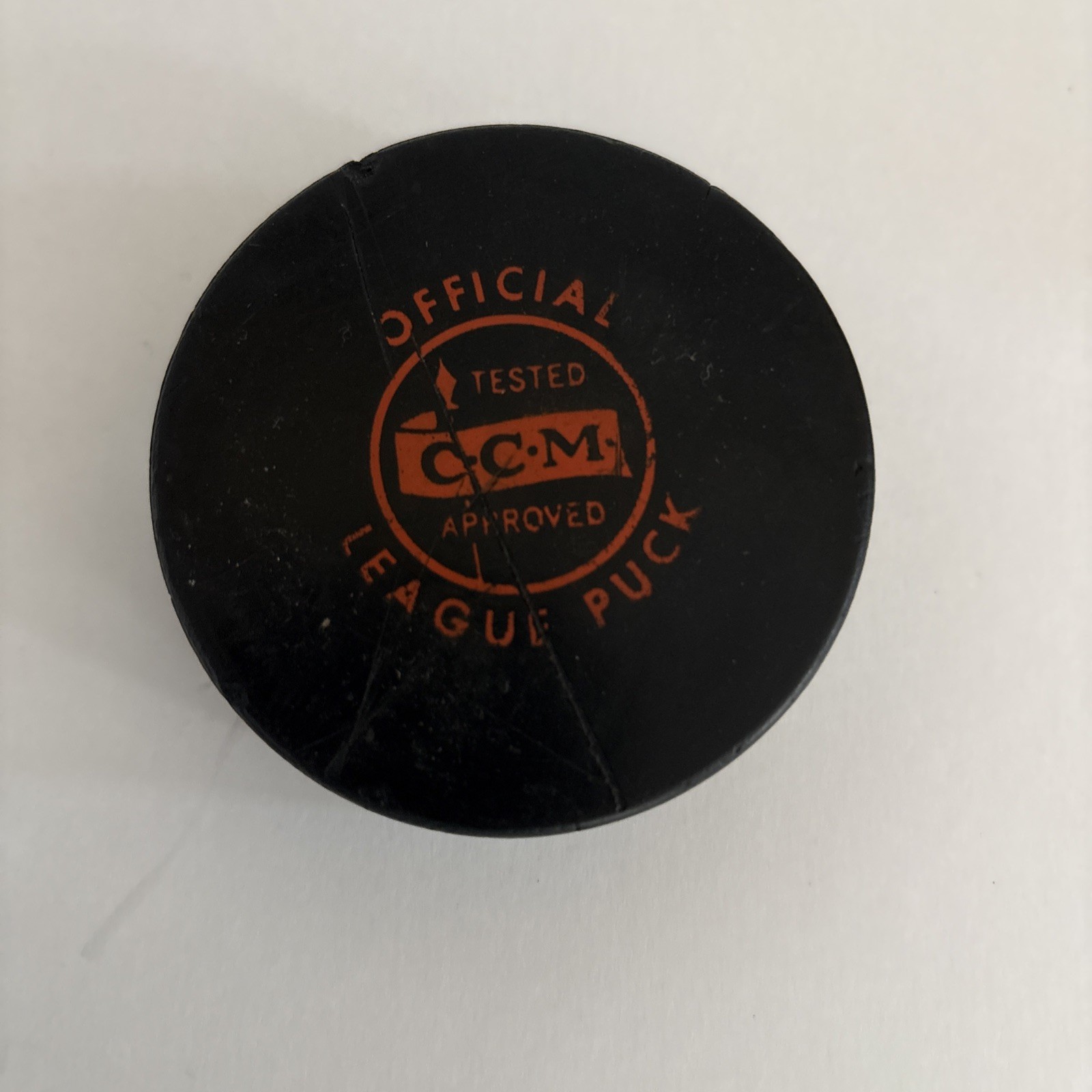 Tested Approved Official CCM League Hockey Puck Black Orange Logo
