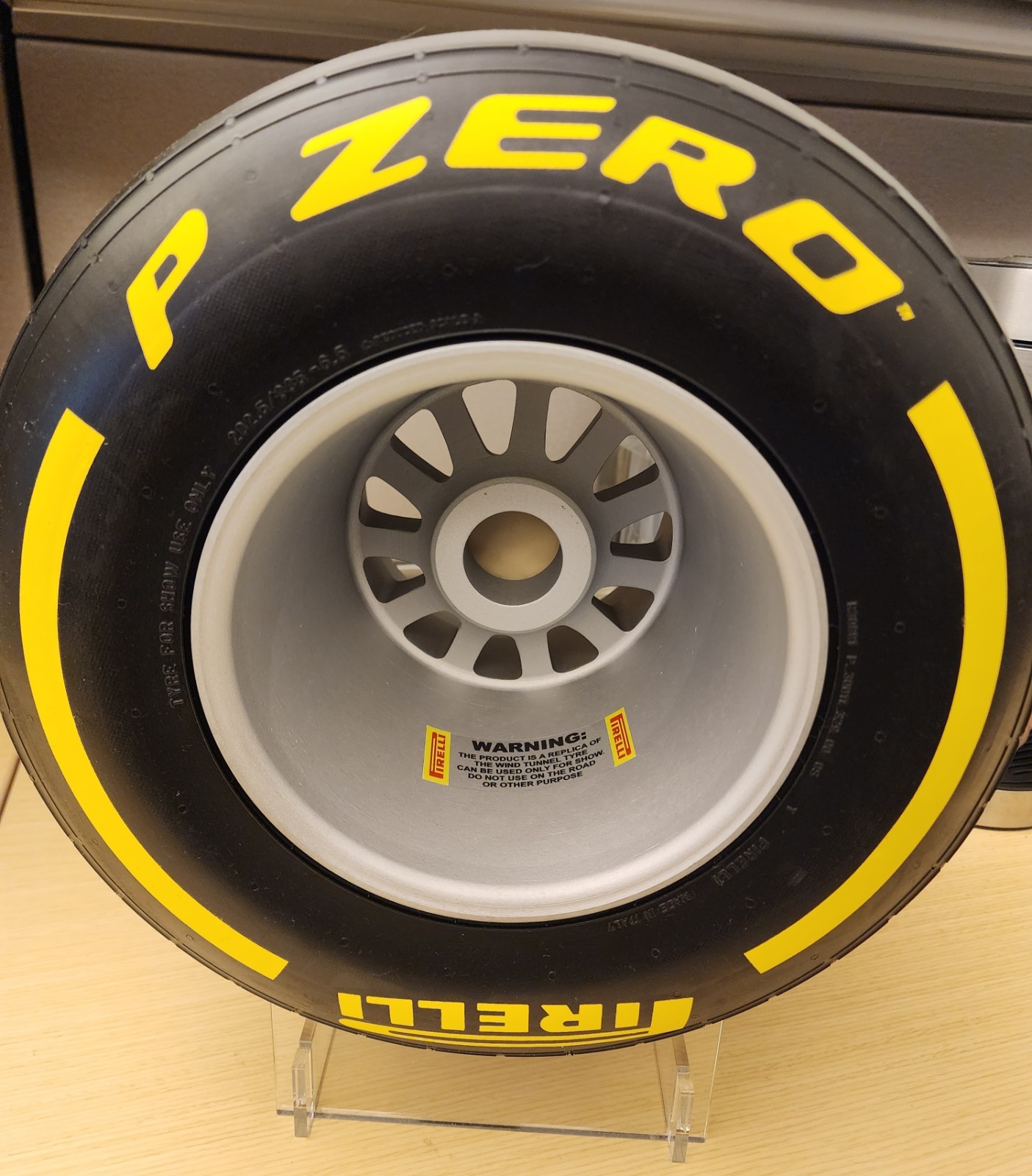 F1 Pirelli Formula One Mini Tire. Yellow Medium Wind Tunnel Pole Position Award