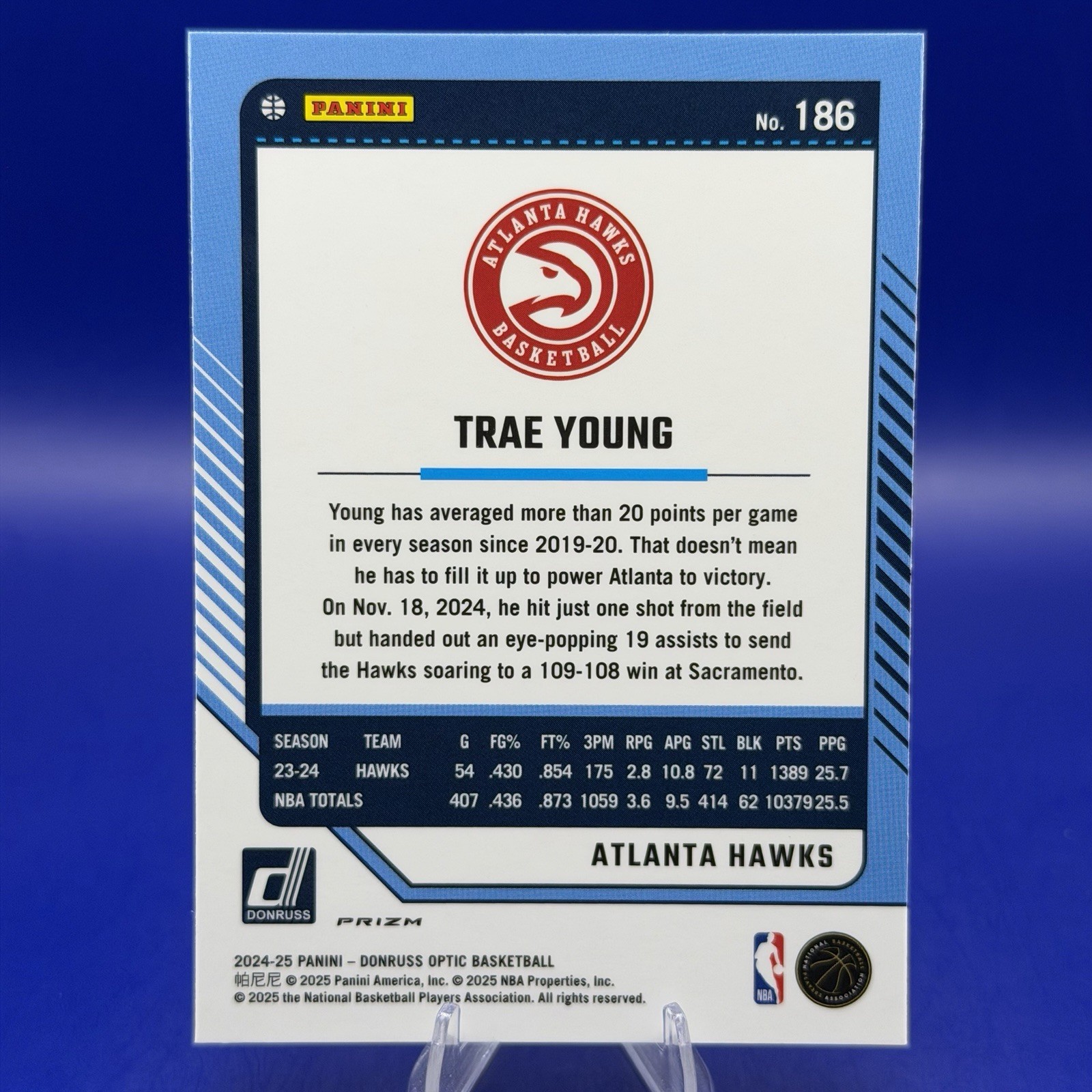 2024-25 Panini Donruss Optic Basketball Trae Young Purple Shock Prizm #186 Hawks
