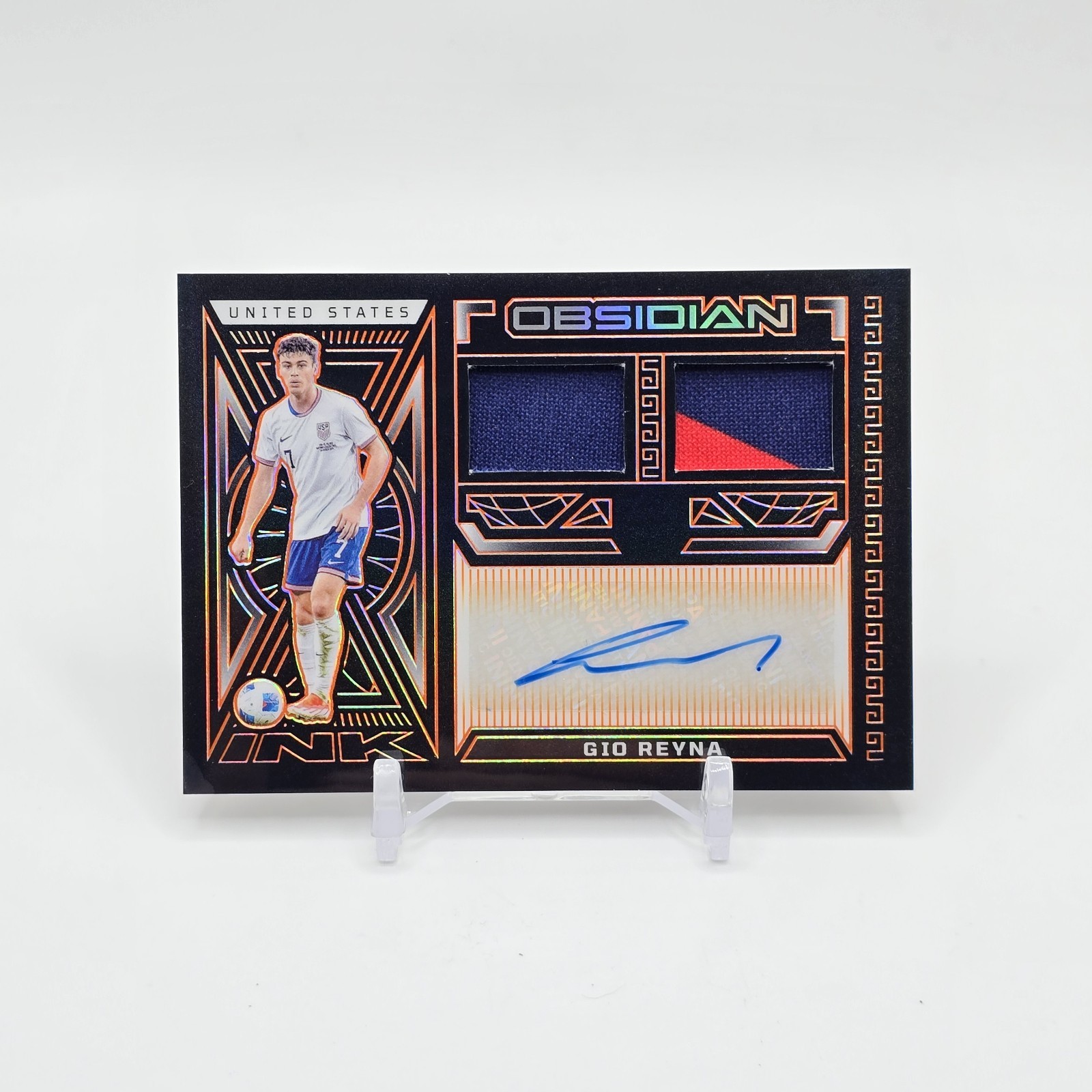2023-24 Panini Obsidian – Dual Jersey Ink Gio Reyna #DJ-GR Orange /49 USMNT Auto
