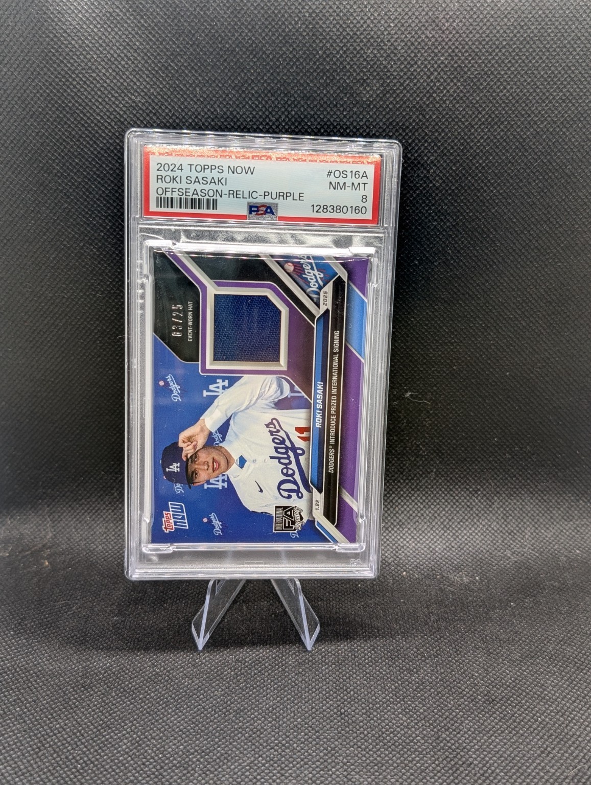 2024 Topps Now Roki Sasaki OS16A Purple Relic /25 PSA 8 Dodgers Event-Worn Hat