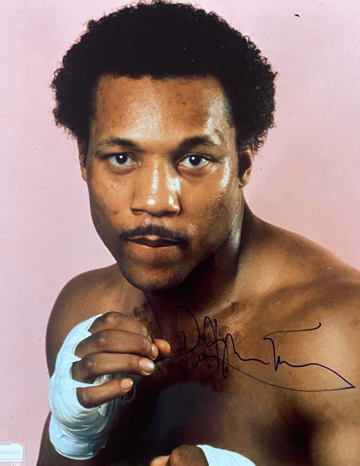 An original signed photograph by Pinklon Thomas (with COA)