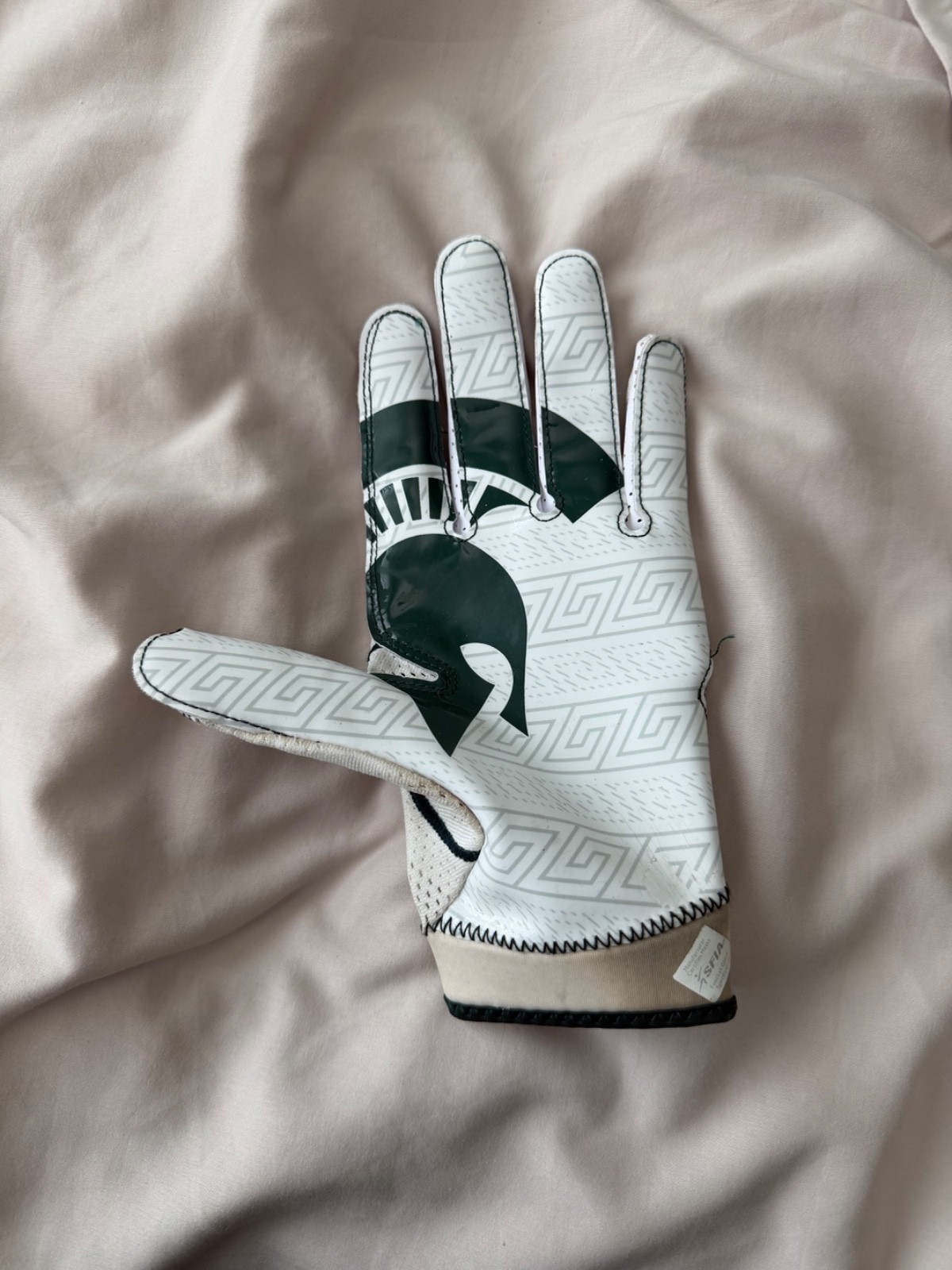 Bowl game used Michigan state football glove