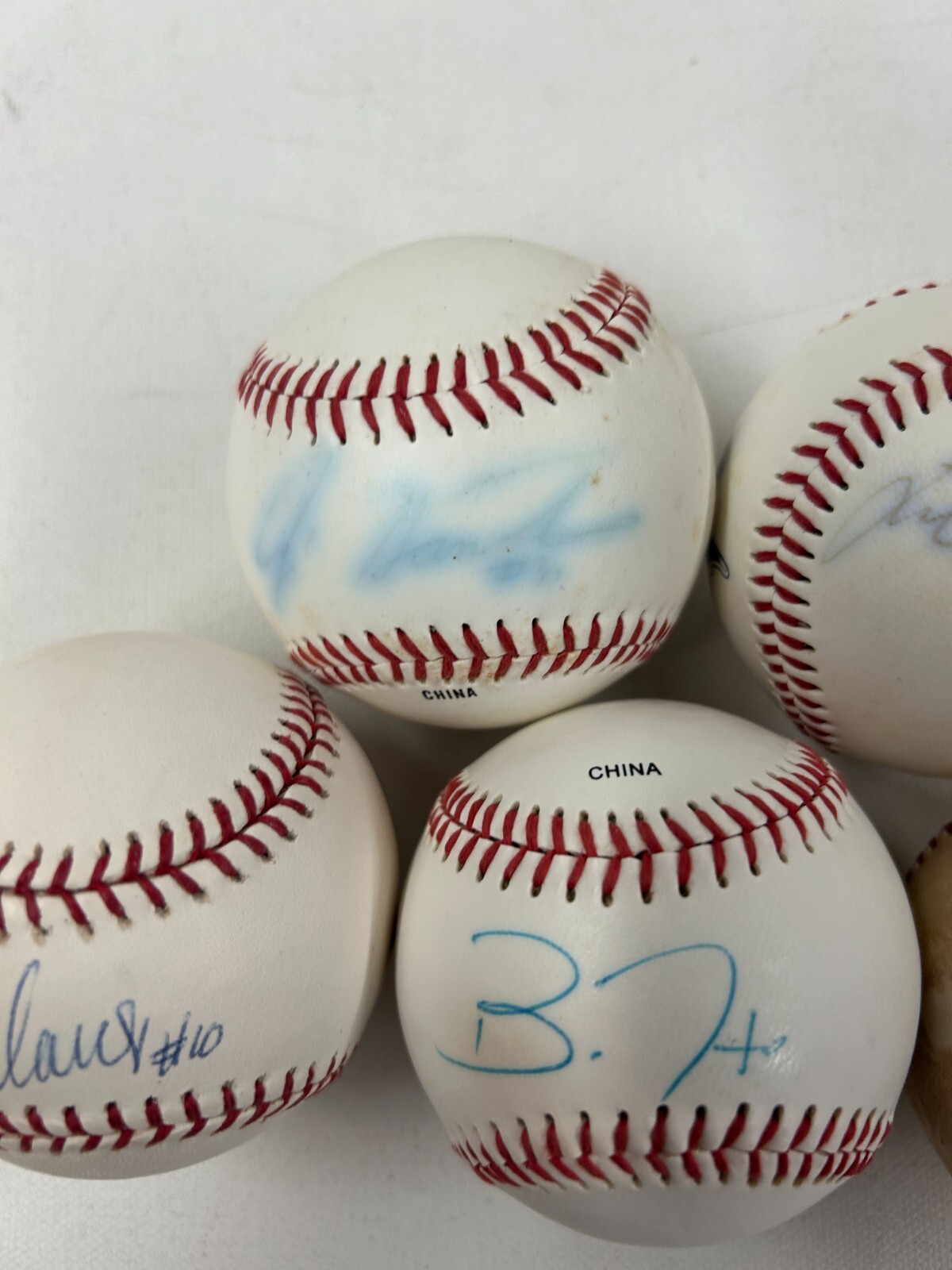 LOT OF 5 MAJOR LEAGUE BASEBALL SOME SIGNED BY UNKNOWN PLAYERS LOT600