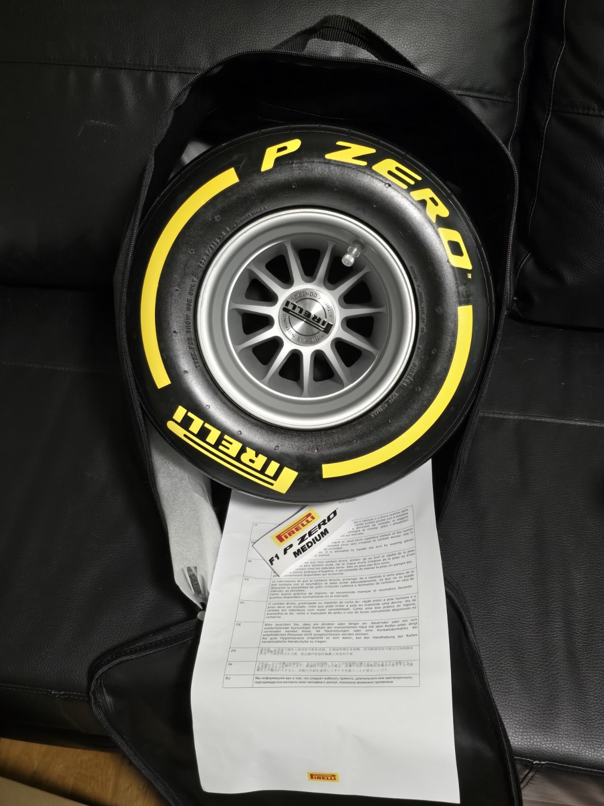 F1 Pirelli Formula One Mini Tire. Yellow Medium Wind Tunnel Pole Position Award