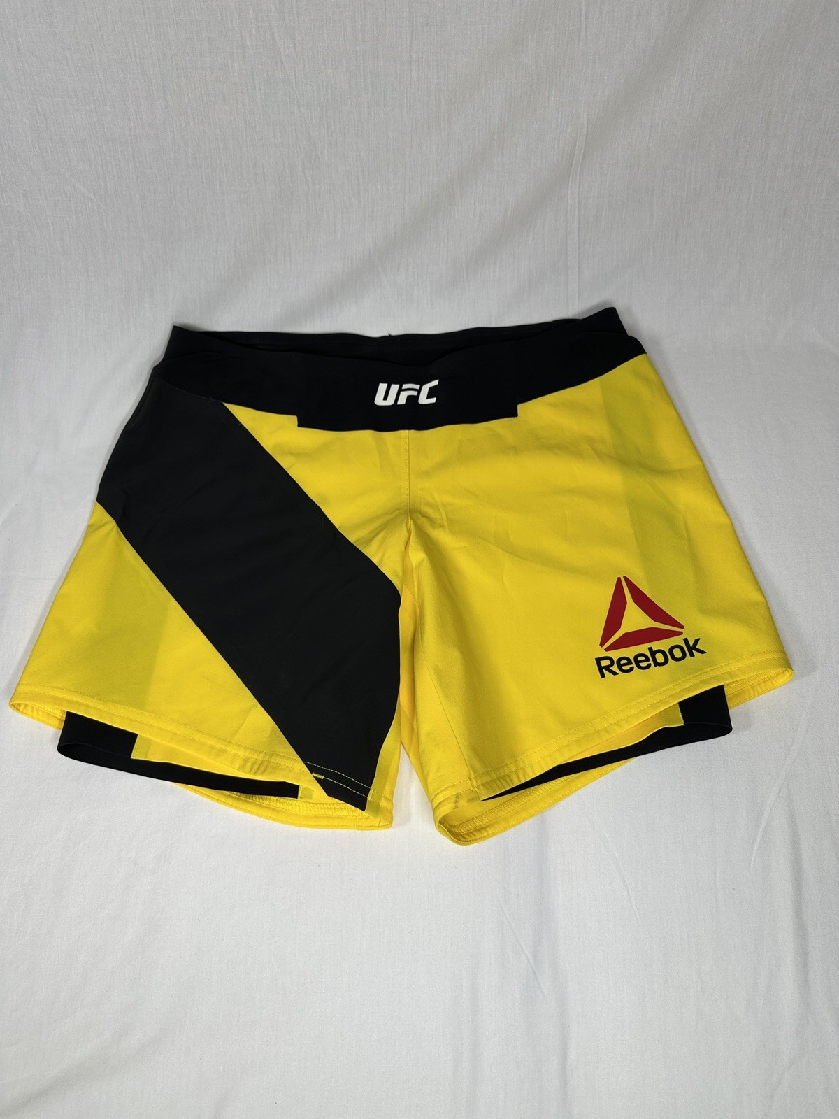 NWOT Reebok UFC CrossFit Women’s S27 Yellow Octagon Speedwick Performance Shorts