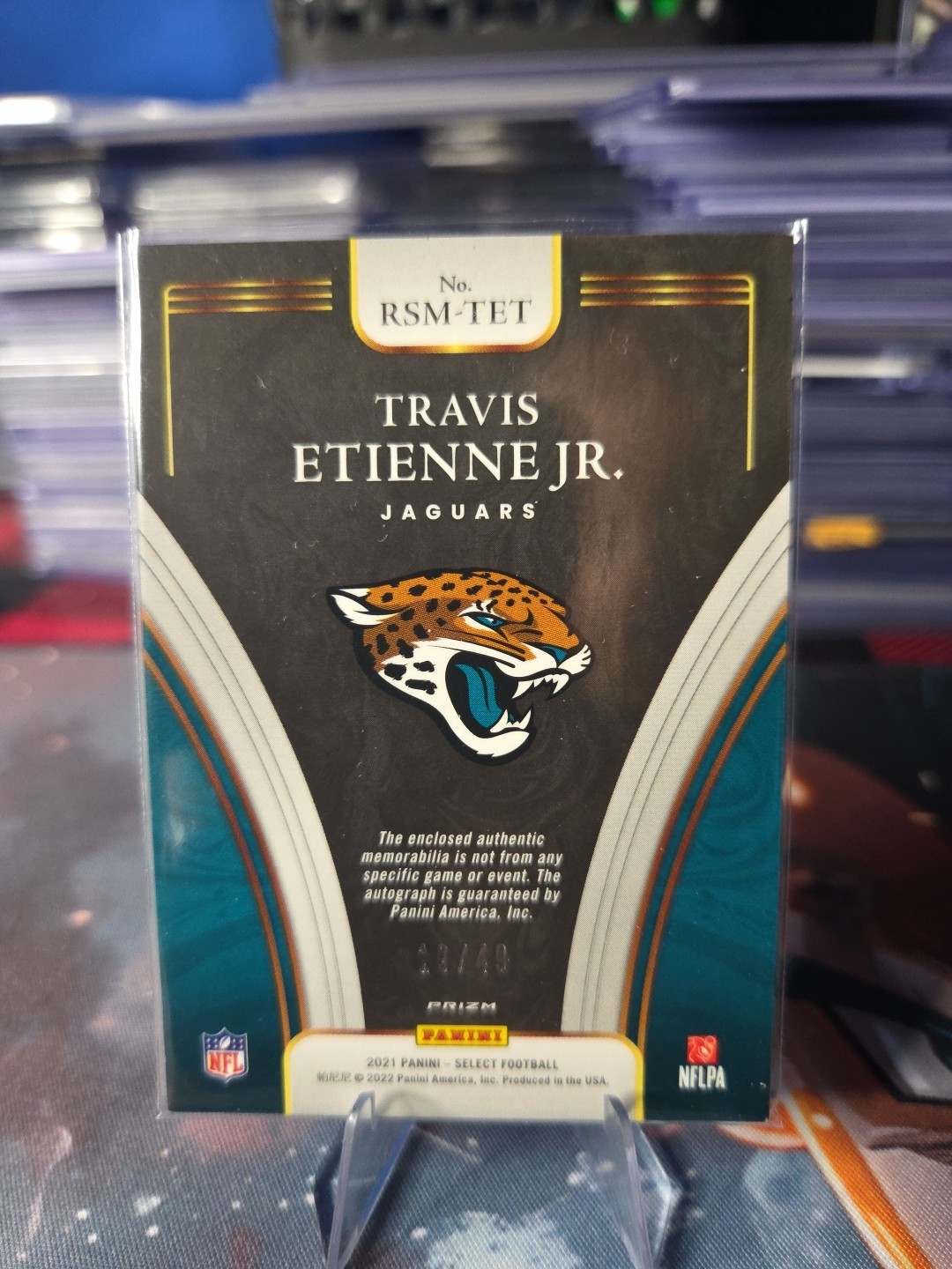 2021 Panini Select – Rookie Signature Memorabilia Travis Etienne #RSM-TET Purple