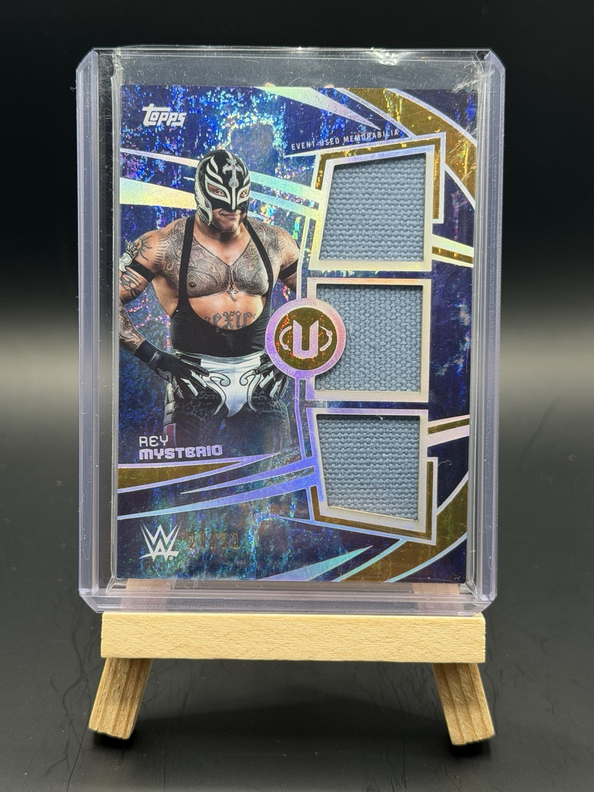 2025 Topps WWE Universe #TRS-RMY Rey Mysterio Triple Mat Relic /25