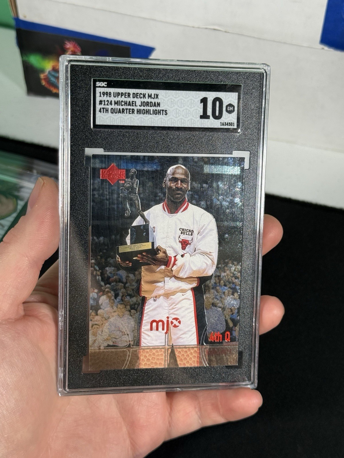 Michael Jordan 1998 Upper Deck MJx #124 SGC 10 GM HOLDING MVP TROPHY GOAT HOF