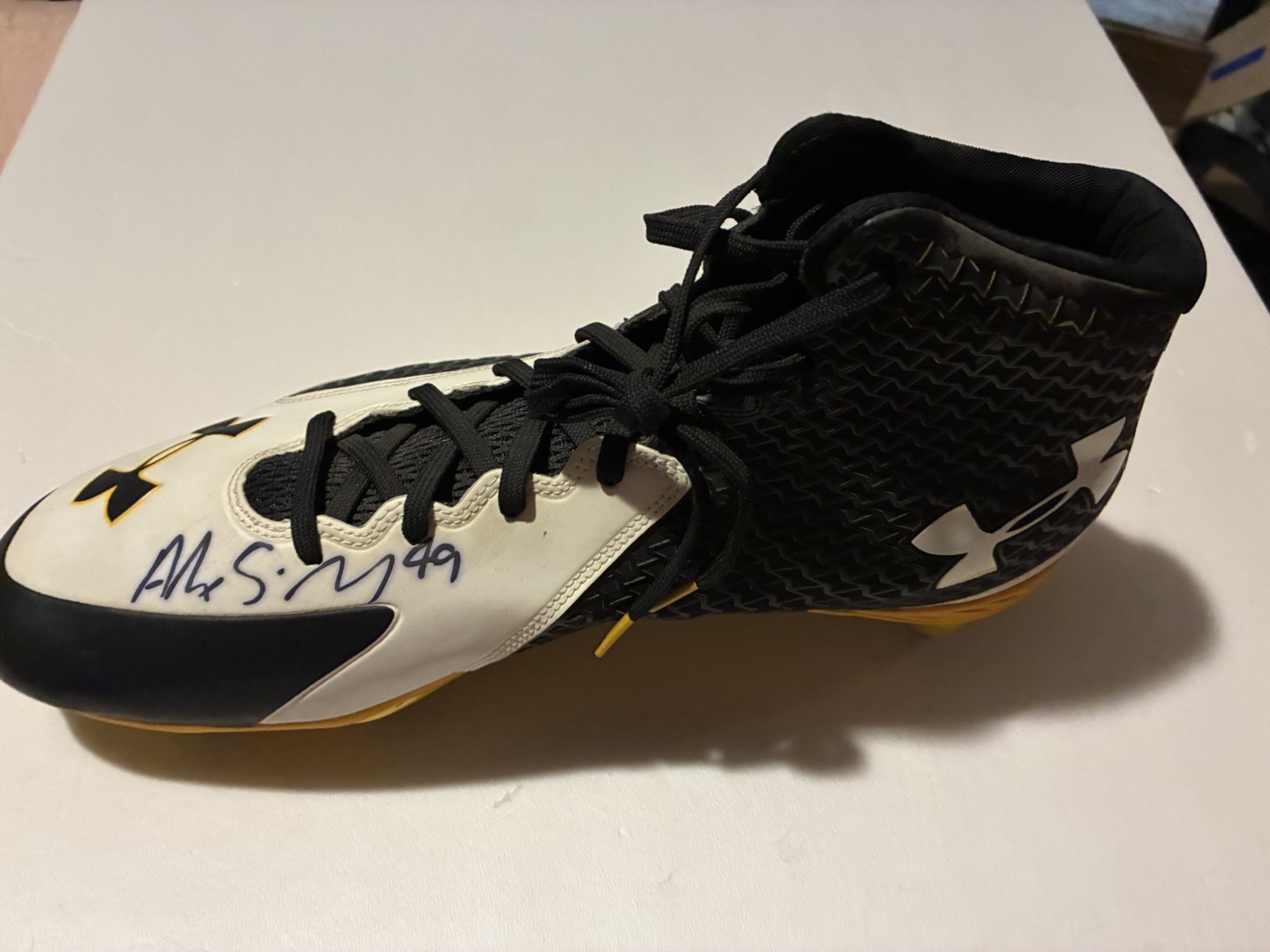 Alex Singleton Autographed cleat signed at event in person