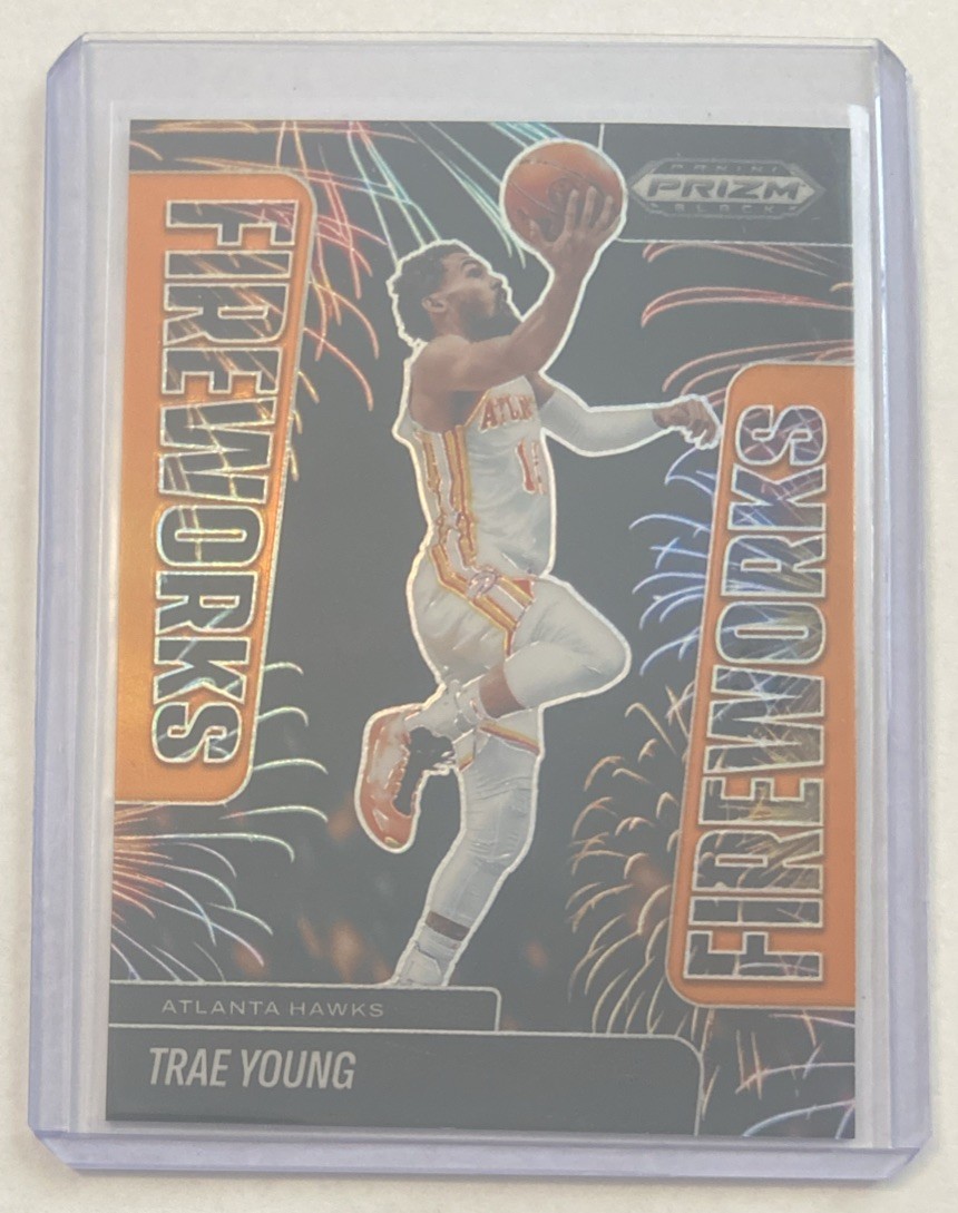 2024-25 Panini Prizm Black Trae Young #d /49 Orange Prizm Fireworks SP Insert