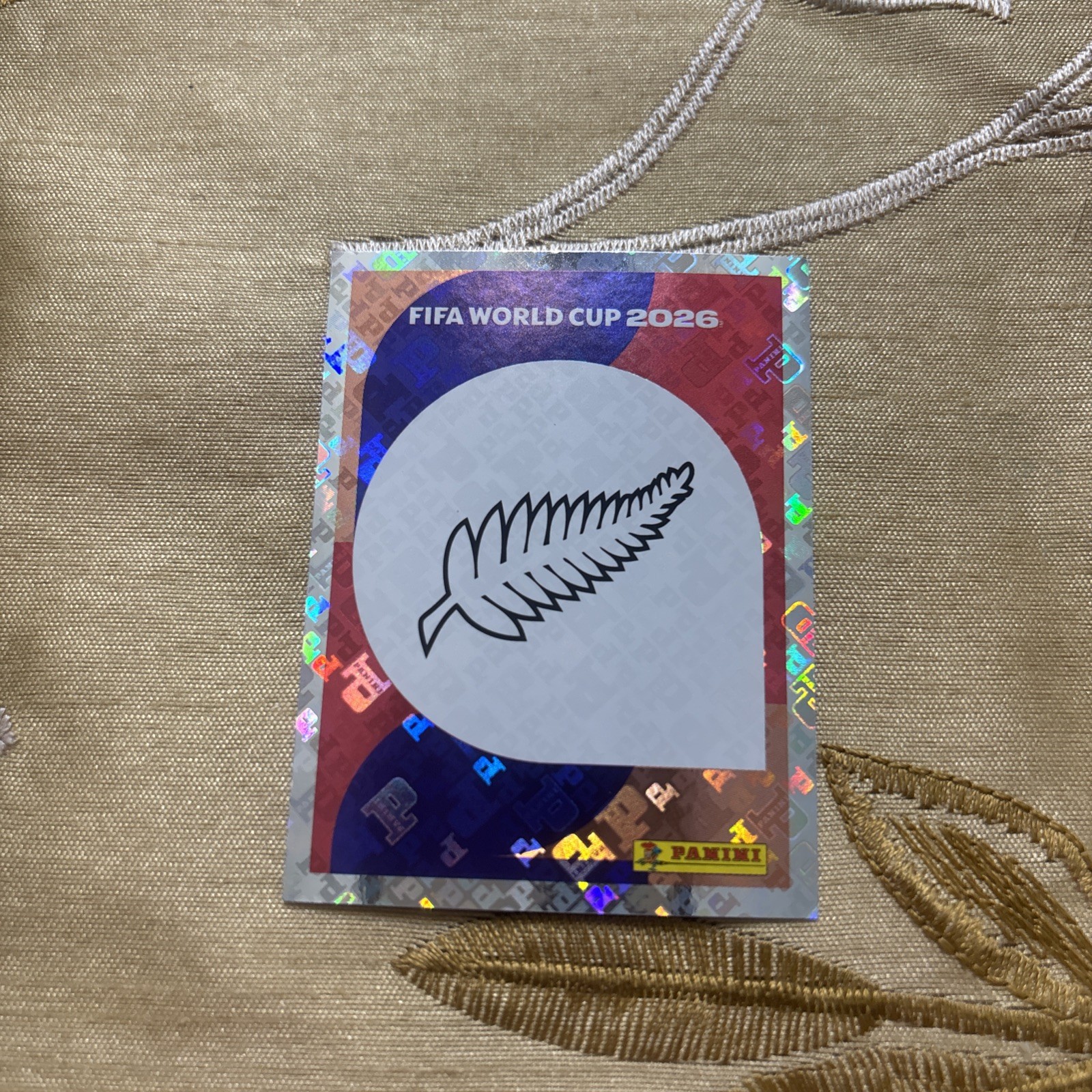 2026 Panini FIFA World Cup Sticker Foil Team Logo Badge #NZL 1 New Zealand