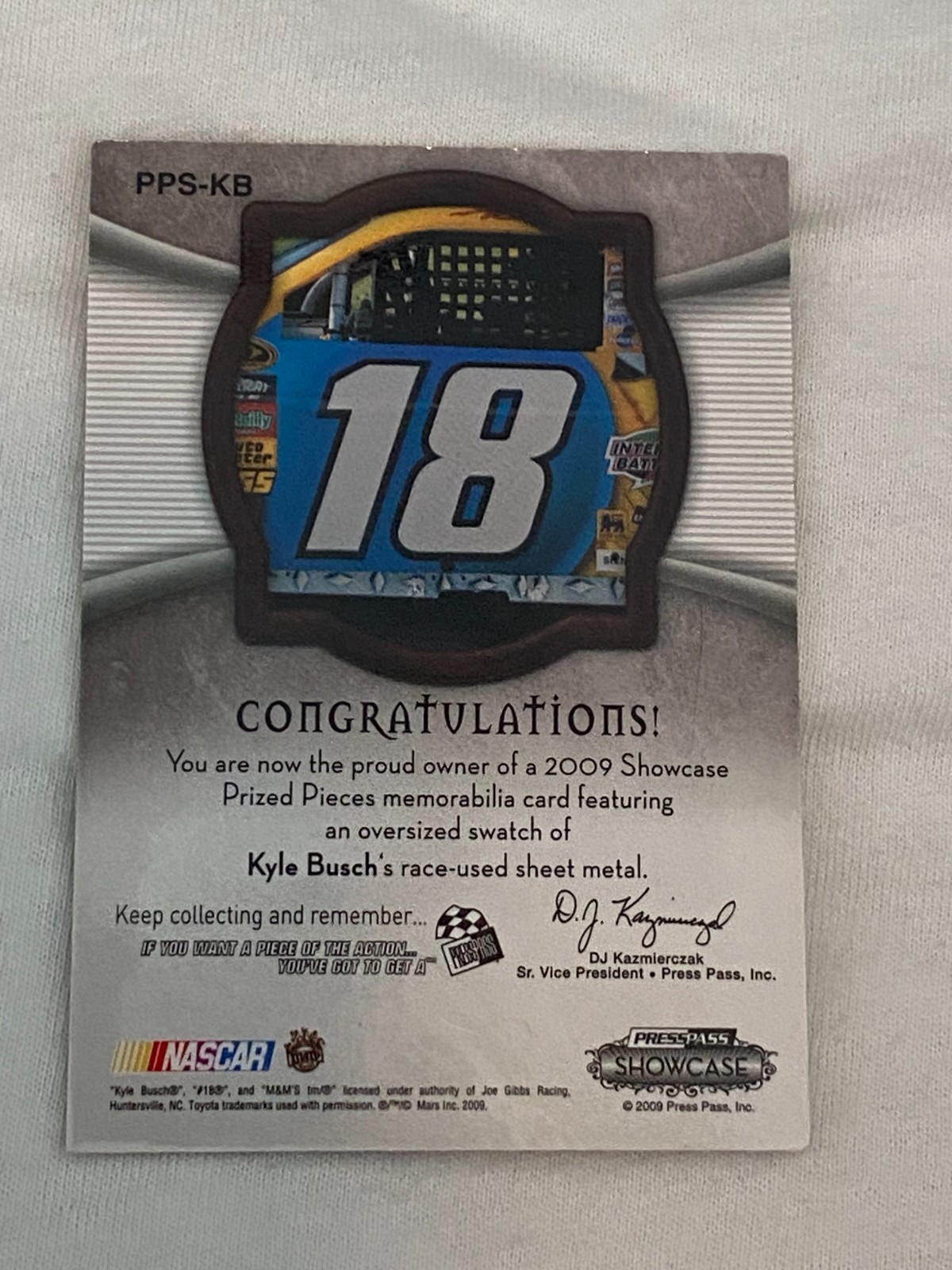 Kyle Busch Auto 2009 Press Pass Prized Pieces Sheetmetal PPS-KB #13/45 (AU/MEM)