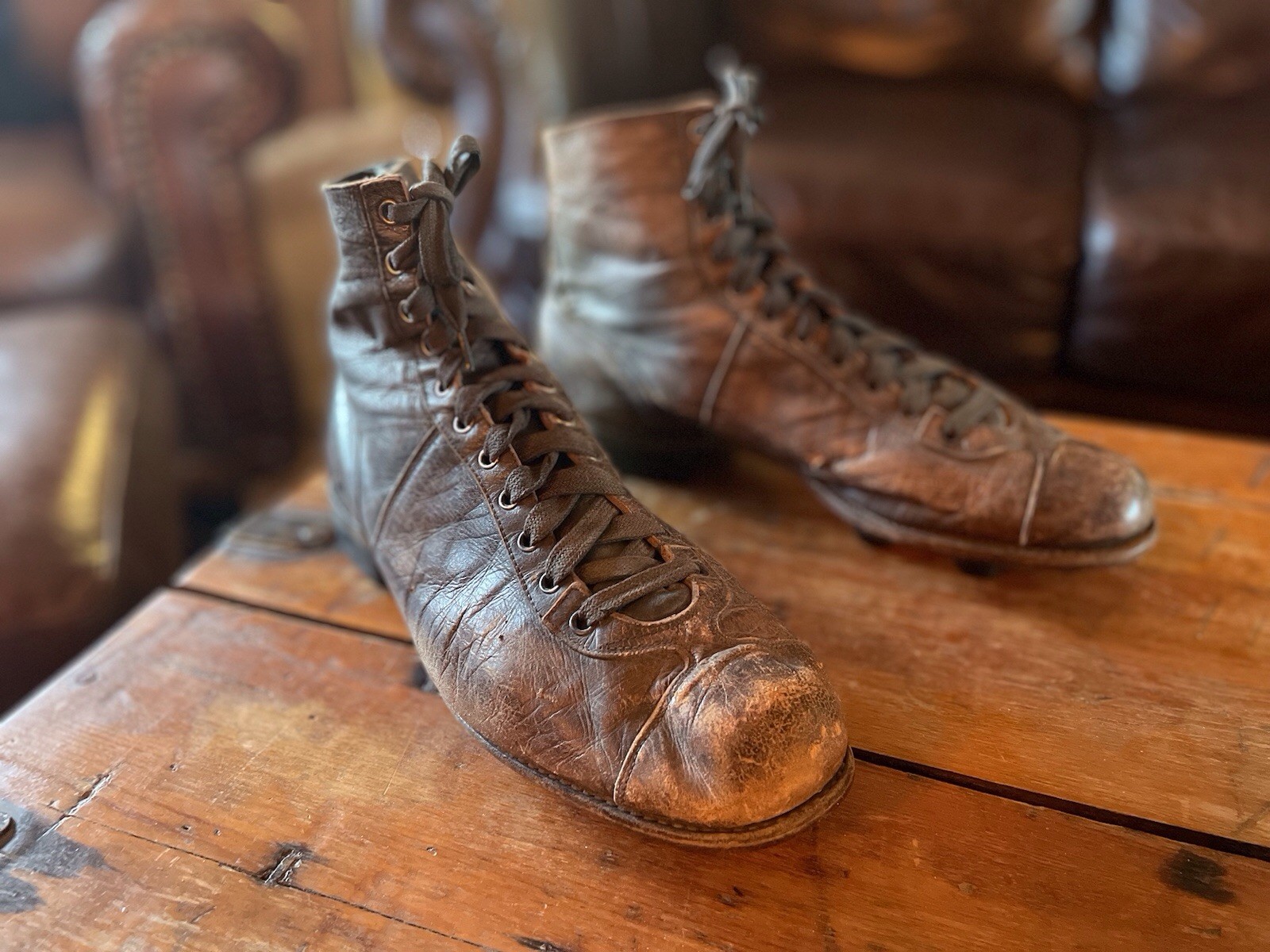Football Rugby shoes antique leather with cleats vintage sports memorabilia
