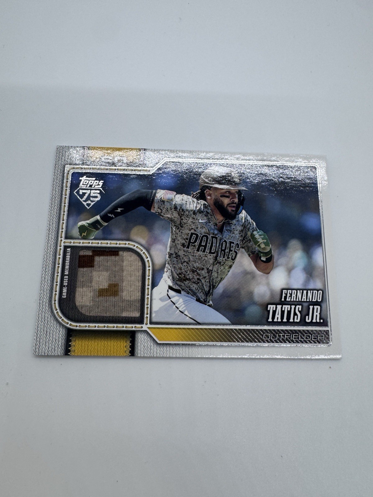 2026 Topps Series 1 #91R-FTJ Fernando Tatis Jr 1991 Game Used Camo Relic Padres