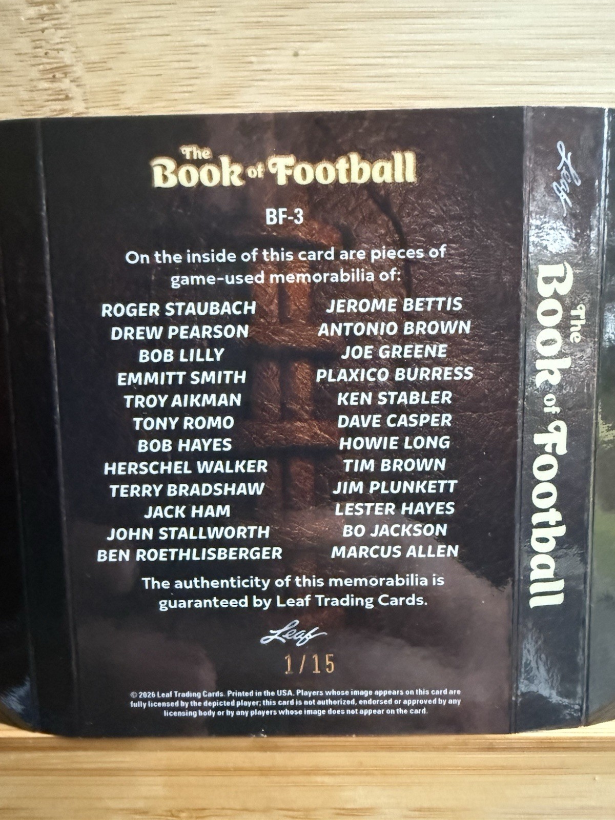 2026 Leaf The Book of Football Spectacular 24 Player Game-Used Booklet #1/15