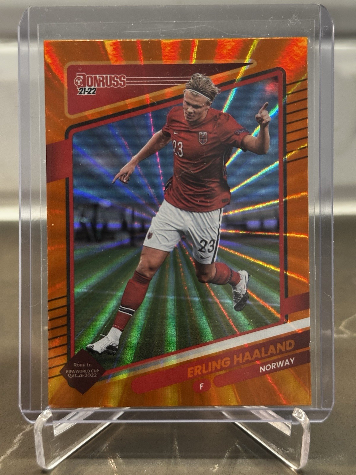 2021-22 Panini Donruss Road to Qatar – Erling Haaland #100 Holo Orange Laser