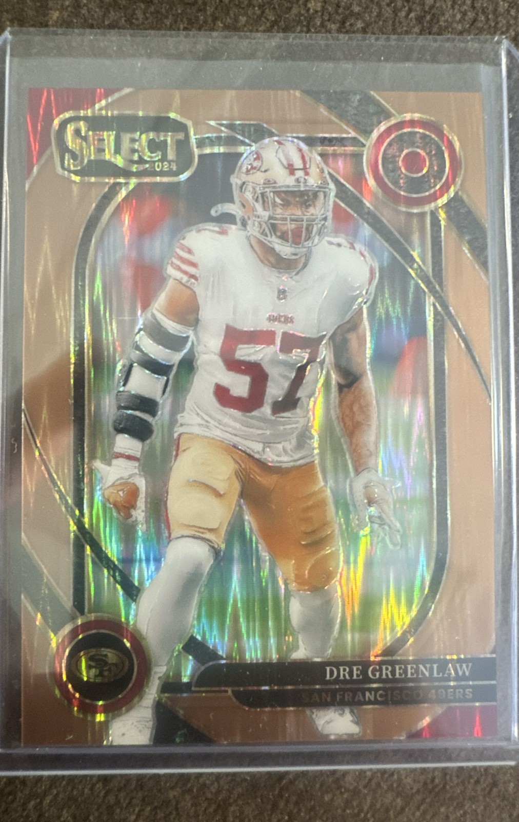 2024 Panini Select – Club Level Dre Greenlaw #252 Copper Shock Prizm /299