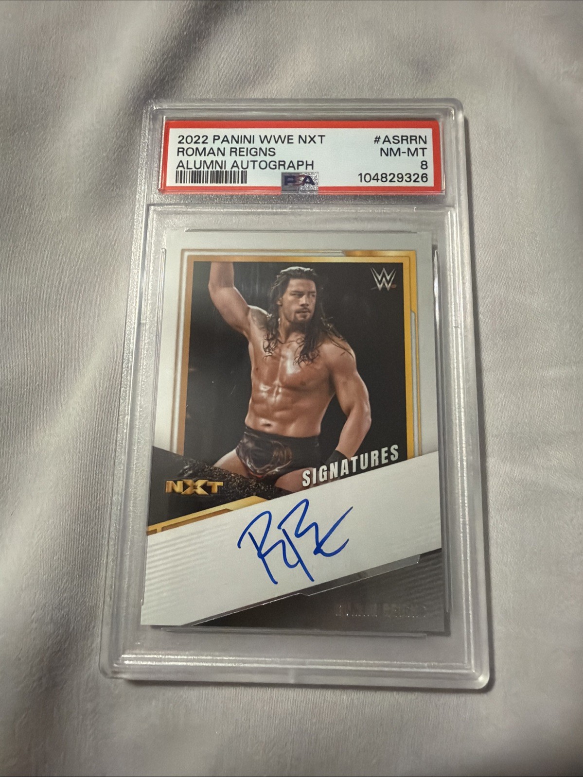 Roman Reigns 2022 Panini NXT 2.0 WWE Alumni Auto #AS-RRN PSA 8