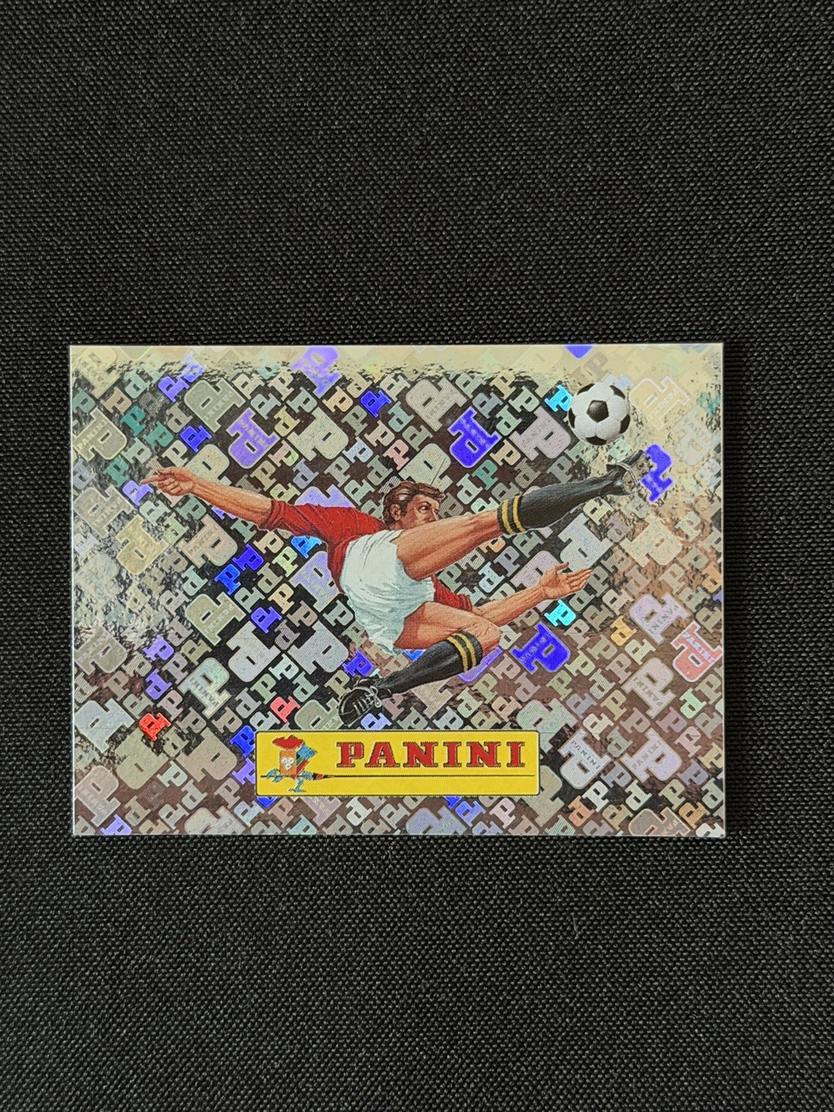 2026 Panini FIFA World Cup – RARE Rainbow Foil Panini Logo Sticker #00