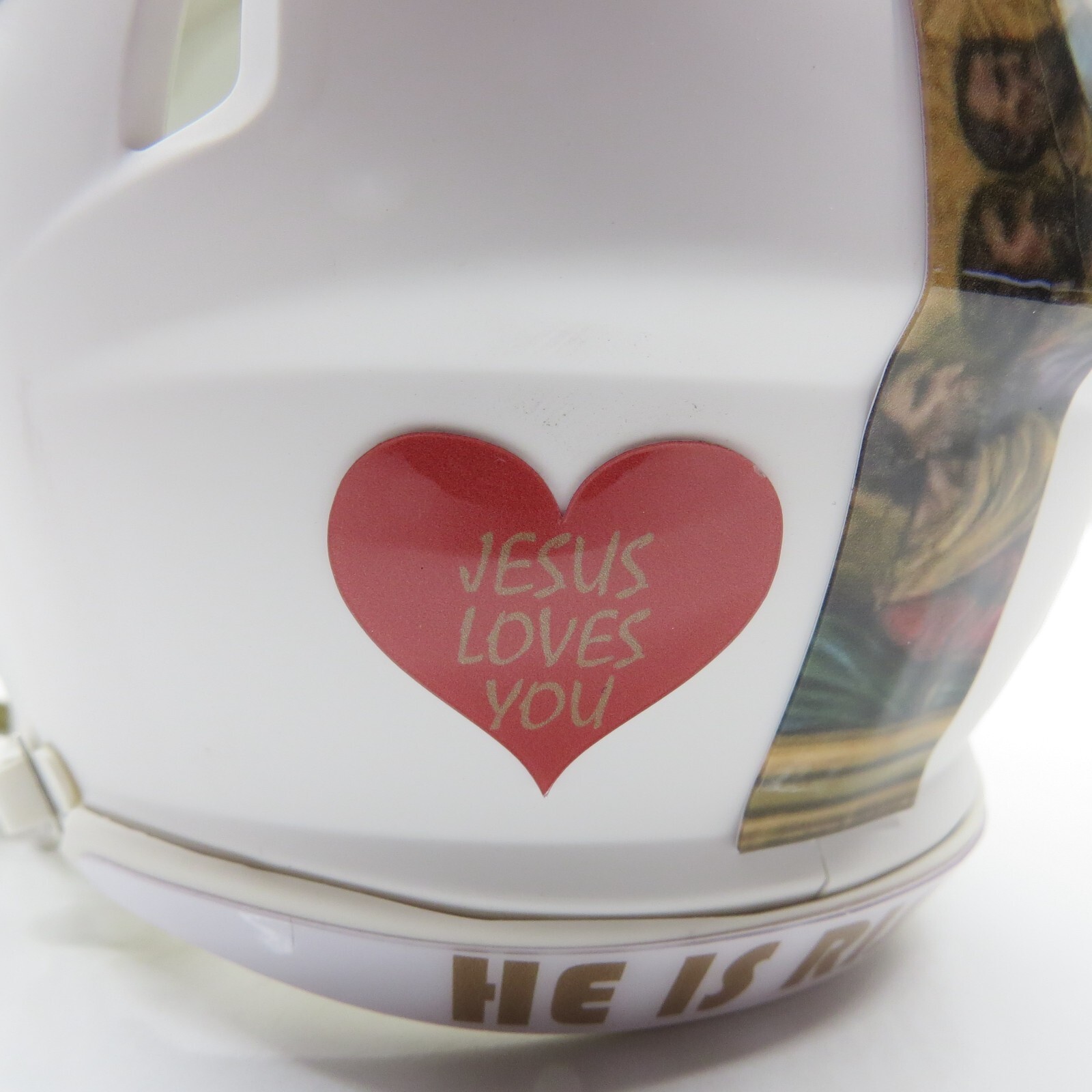 Jesus Custom White Mini Helmet woth a gold facemask and visor