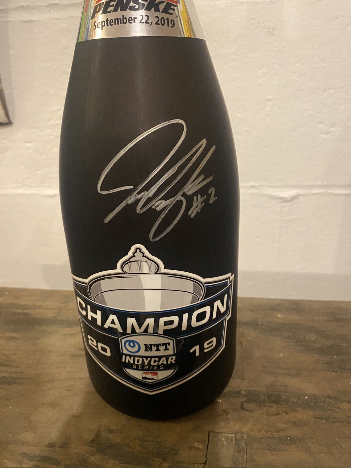 Autographed Josef Newgarden 2019 IndyCar Champion Team Issued Champagne Bottle