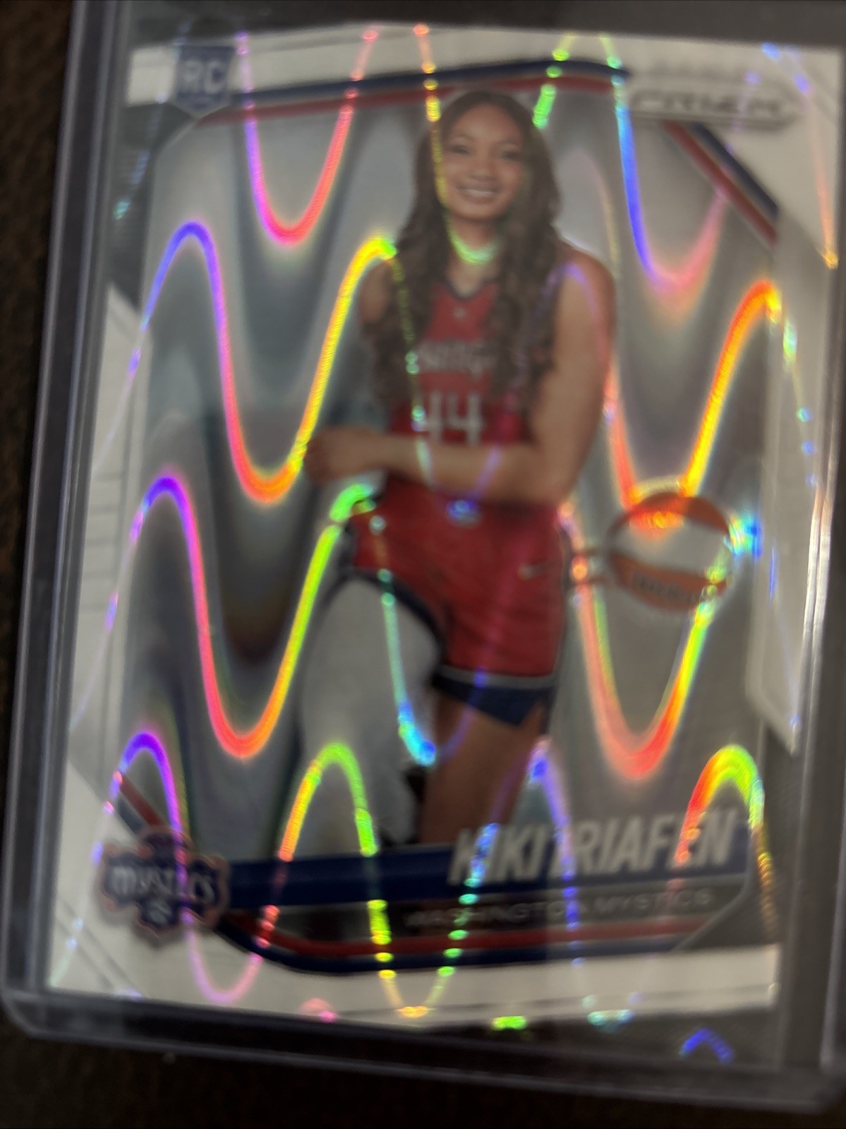 2025 Panini Prizm WNBA – Rookie Variation Kiki Iriafen #149 White Seismic Prizm