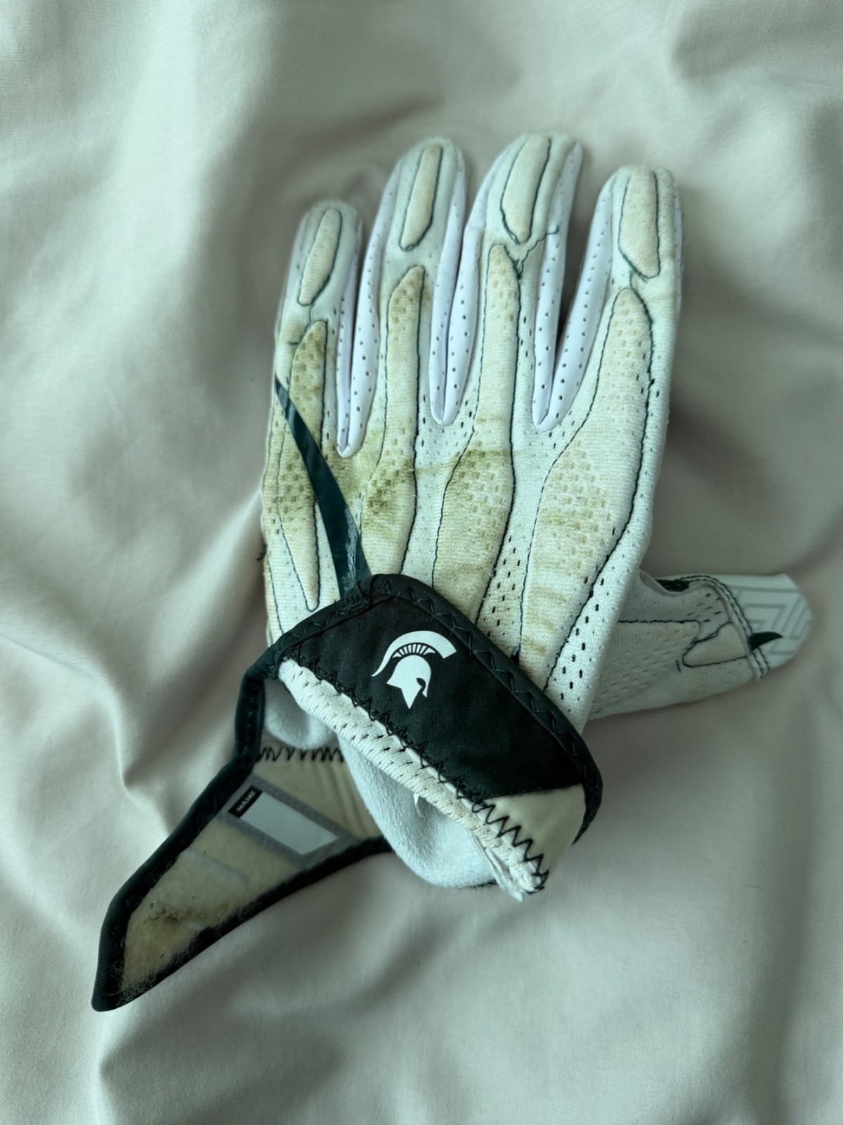 Bowl game used Michigan state football glove