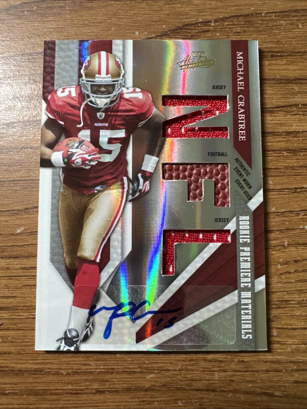 2009 Playoff Absolute Memorabilia Michael Crabtree Jersey Ball Auto RC #/299