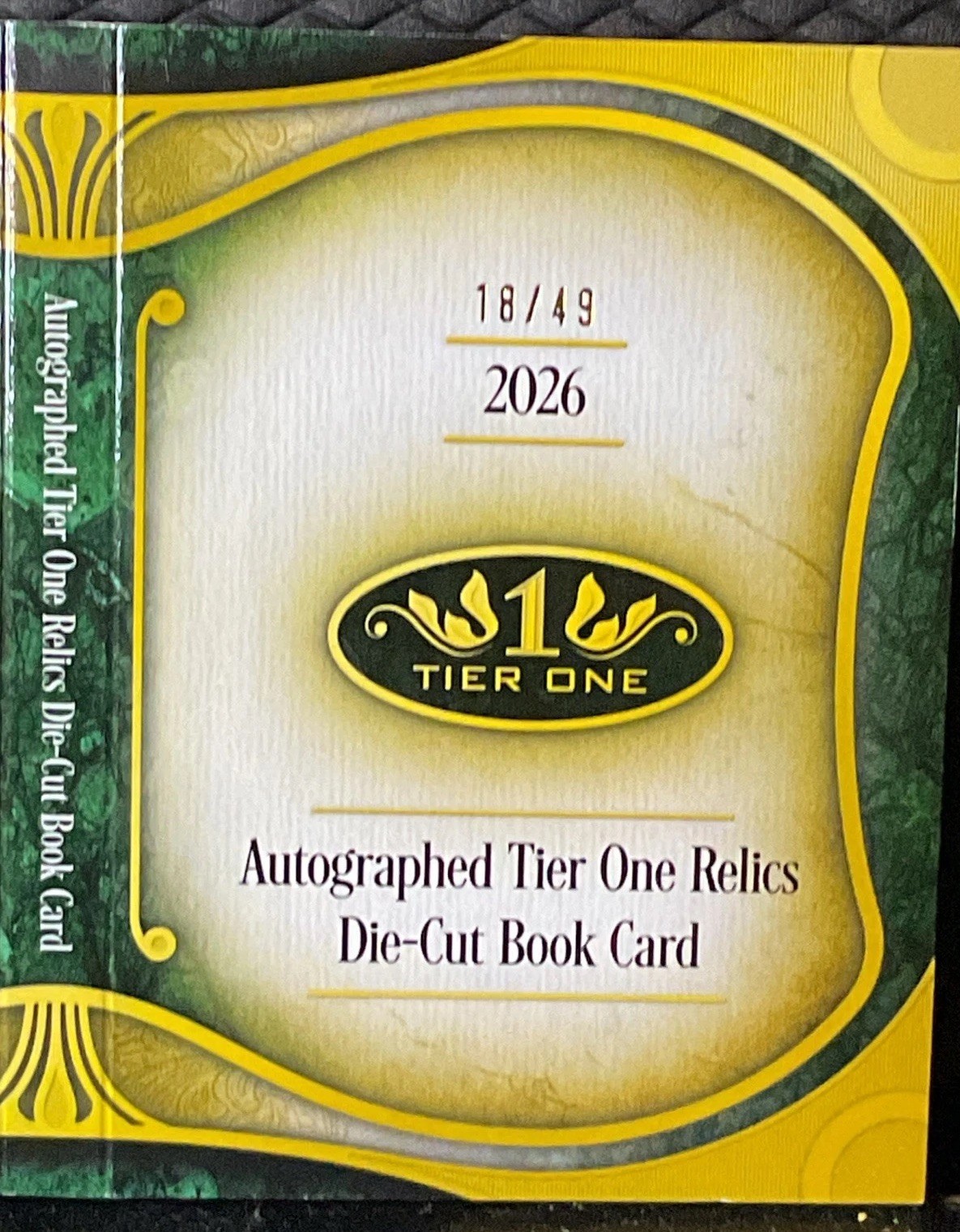 Topps 2026 Tier One Jackson Chourio Auto Relic Die-Cut Book ARDB-JCH 18/49 Wood