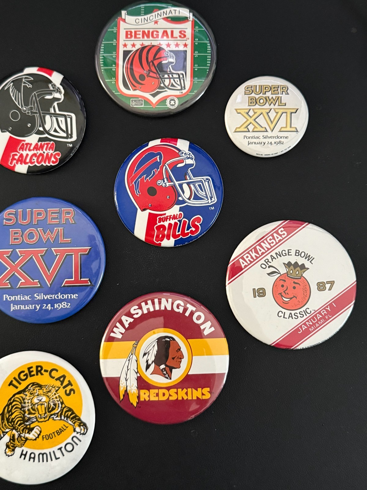 Lot of 11 Vintage Football Pinback Buttons NFL CFL Super Bowl Orange Bowl Pins