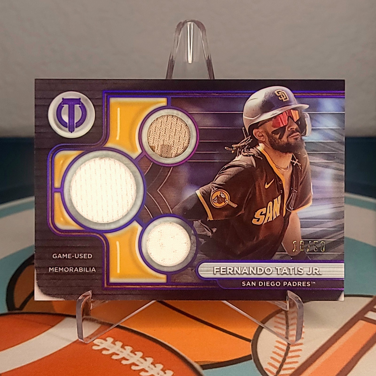 2024 Topps Tribute – Triple Relics Fernando Tatis Jr. #TTR-FT Purple /50