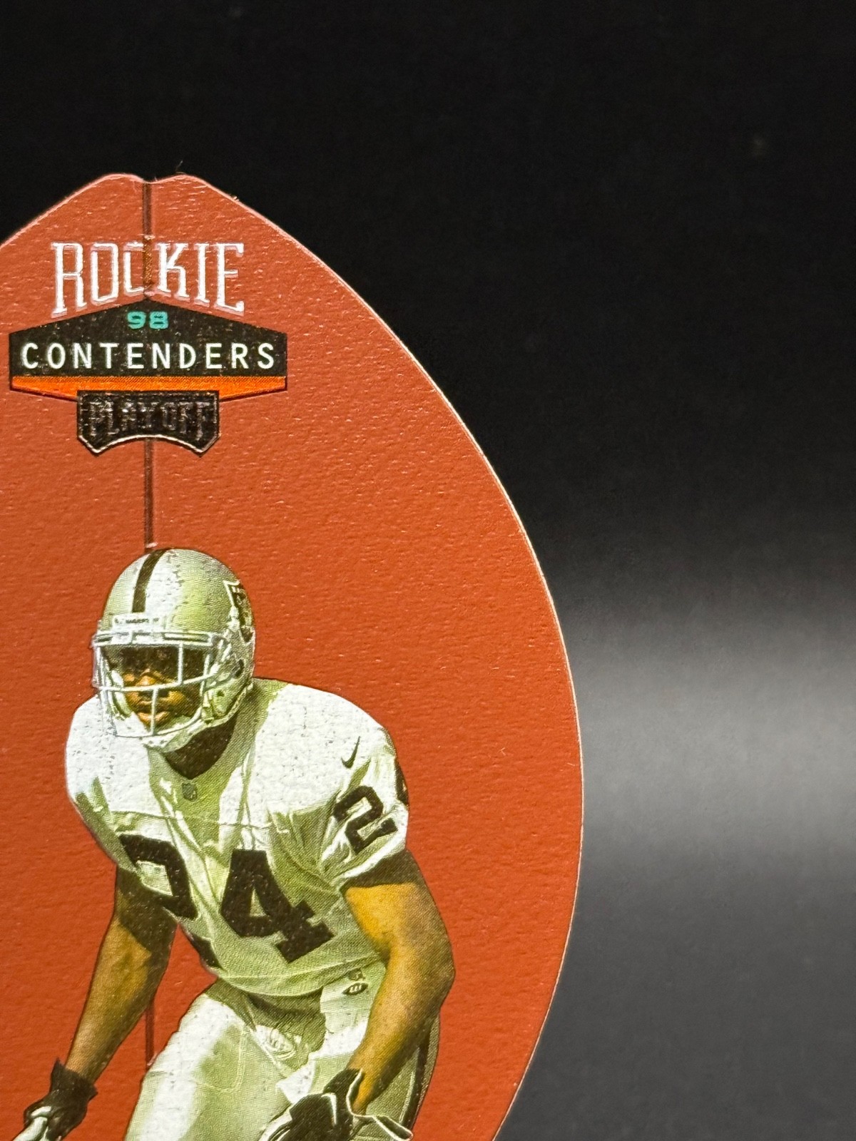 1998 Playoff Contenders – Charles Woodson #69 Leather Football (RC) Rookie- NG1
